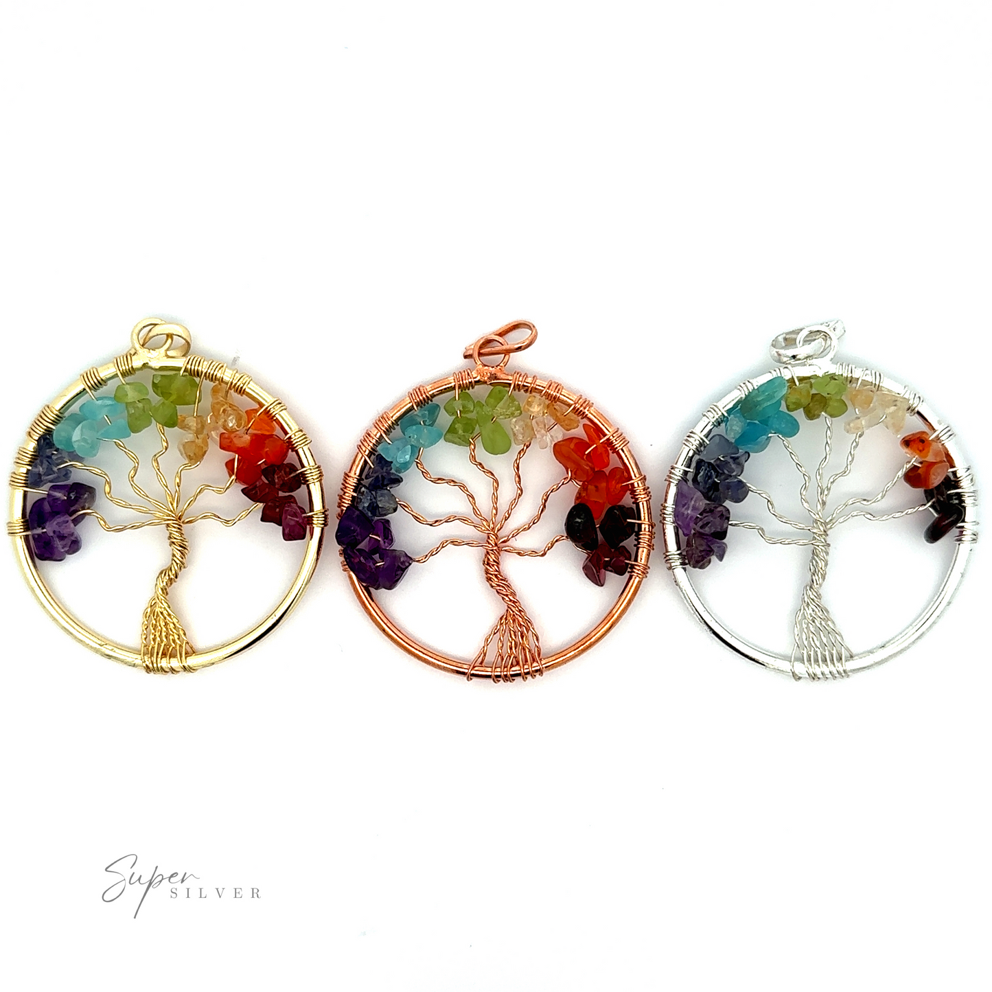 
                  
                    Three circular Wire-Wrapped Chakra Tree of Life Pendants featuring exquisite wire-wrapped tree designs with multicolored chakra stone leaves. The pendants have frames in gold, copper, and silver colors, respectively.
                  
                