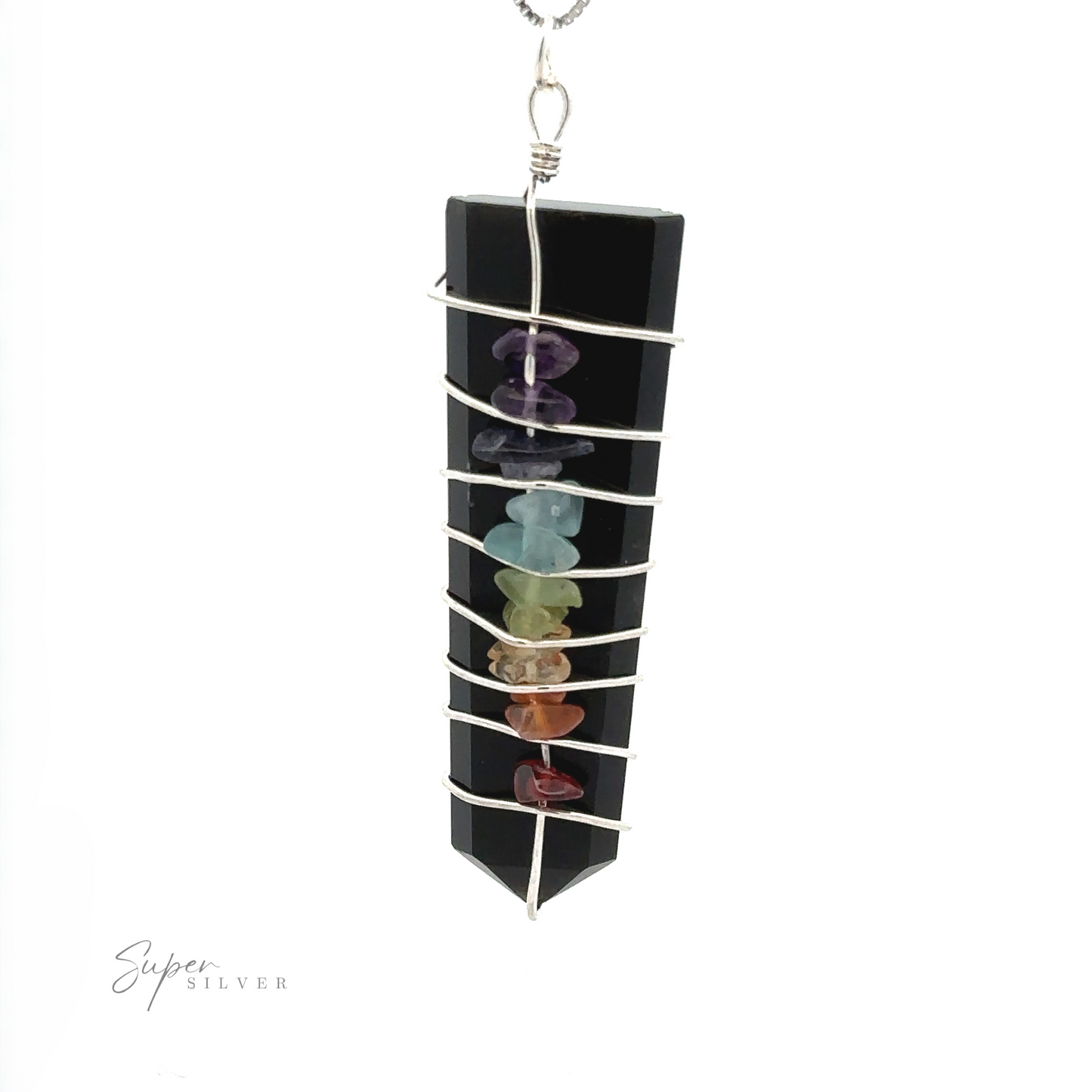 
                  
                    A black pendant wrapped in silver wire, featuring six small chakra stones in a vertical line, creating a striking piece for those who appreciate the beauty of the Stone Slab Wire-Wrapped Chakra Pendant.
                  
                