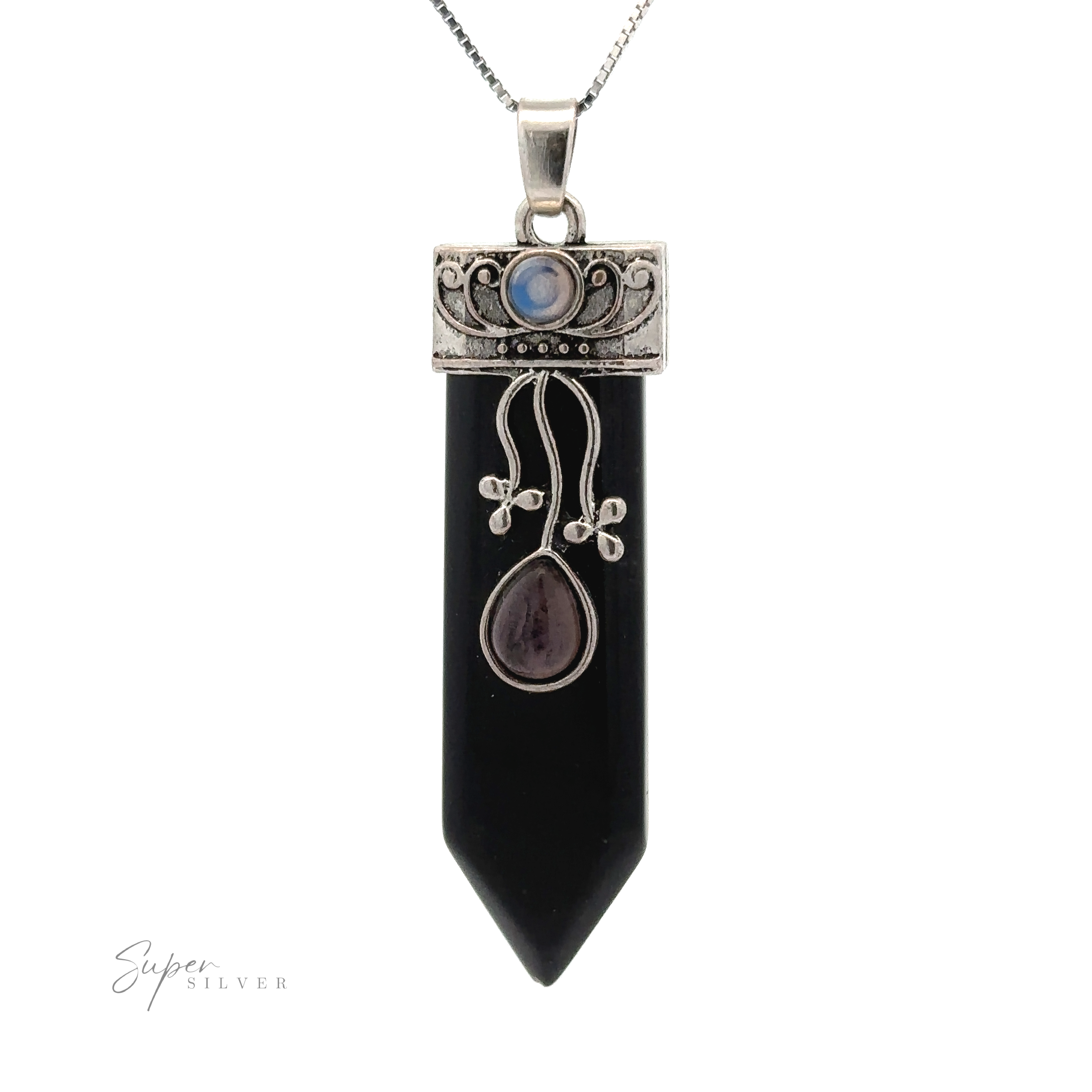 A metallic pendant featuring intricate designs and gemstones, with a pointed black stone hanging from a delicate chain. This Obelisk Crystal Stone Pendant exudes elegance and charm.