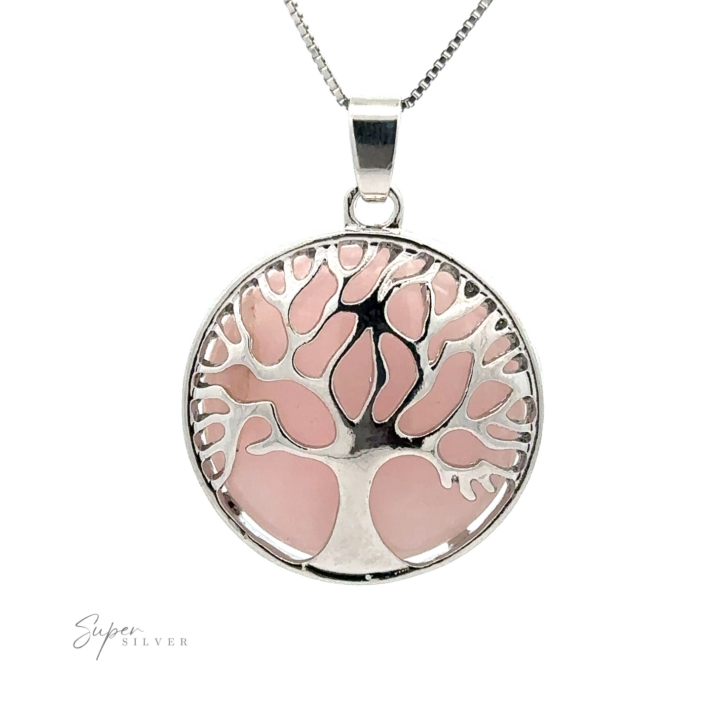 
                  
                    A Tree of Life Pendant with a circular Tree of Life pendant against a pink background. The pendant hangs from a thin chain, and the text "Super Silver" is visible in the bottom left corner.
                  
                