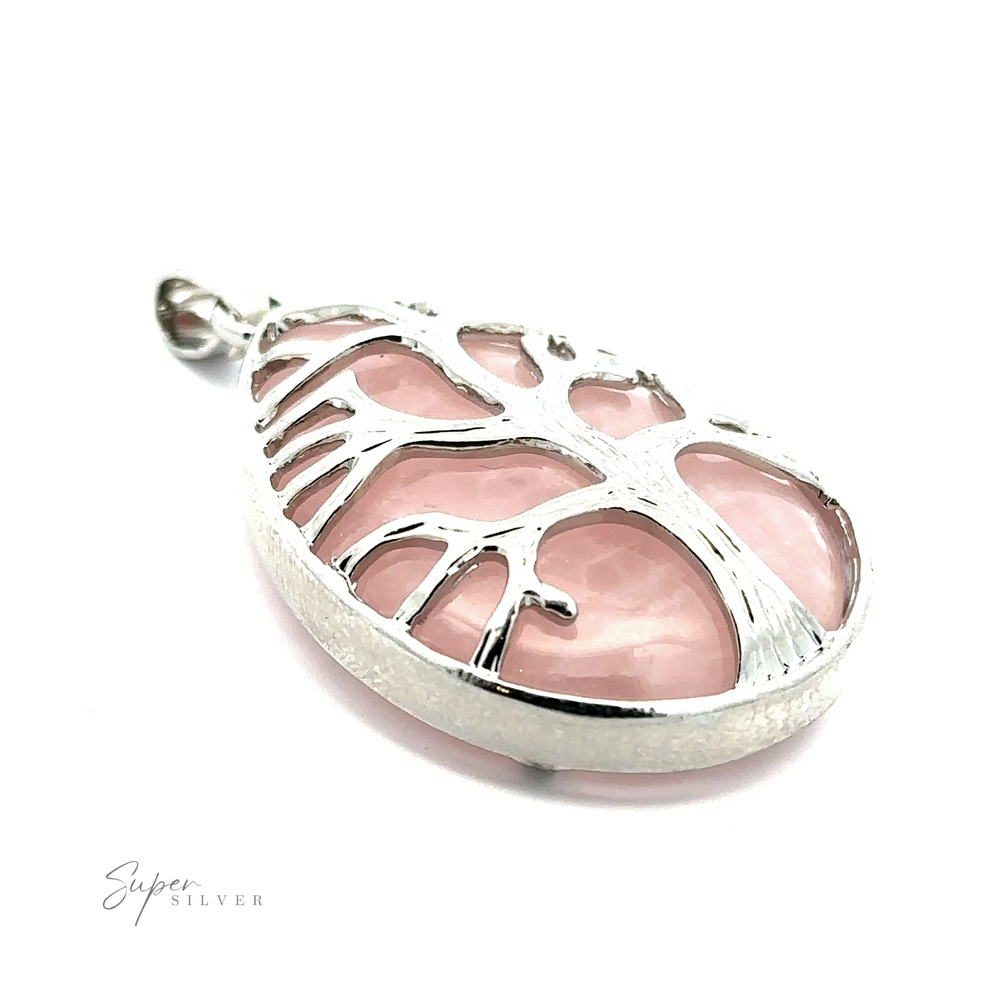 
                  
                    A Teardrop Shape Stone with Silver Plated Tree Of Life Pendant. The words "Super Silver" are faintly visible in the bottom left corner.
                  
                