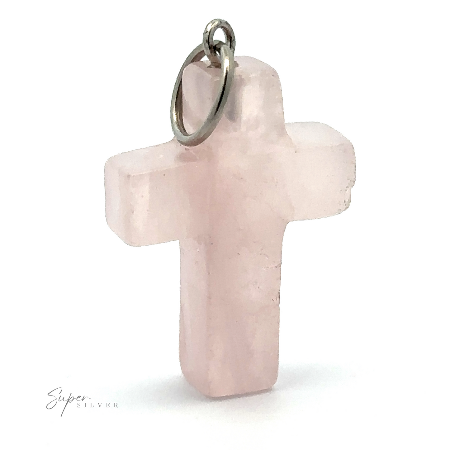 A small, pink Stone Cross Pendant made of rose quartz with a metal loop at the top for attaching to a necklace. The words "Super Silver" are visible on the bottom left corner.