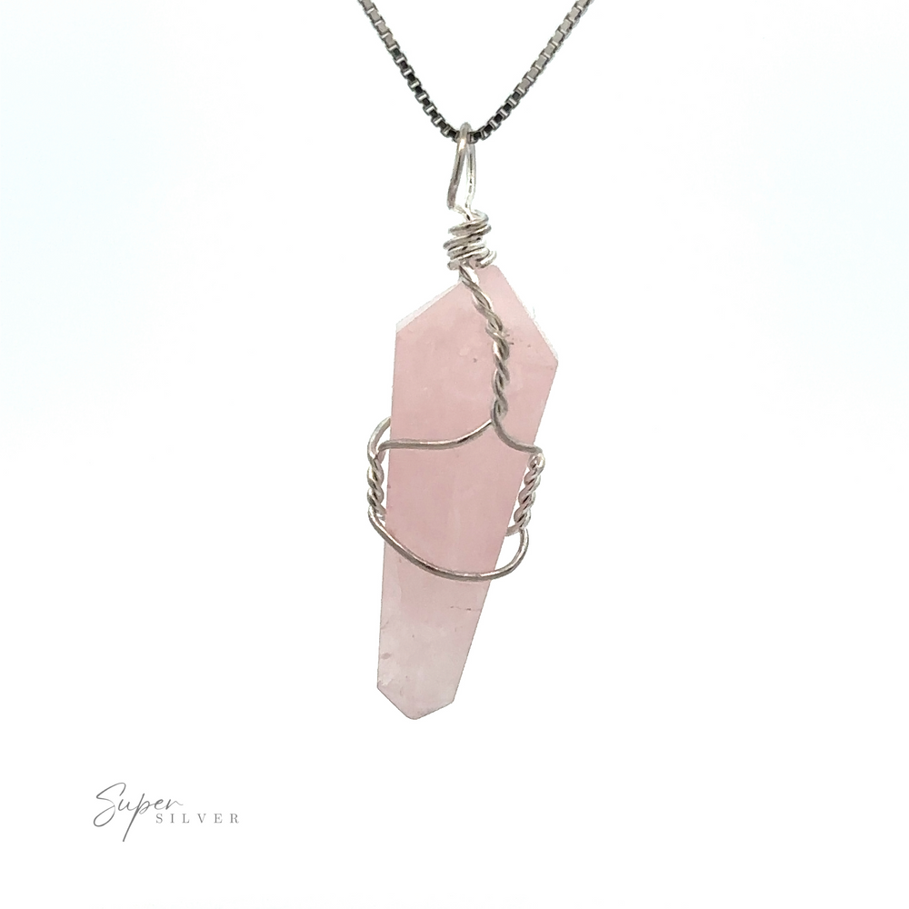 
                  
                    A Wire-Wrapped Stone Pendant featuring a beautiful pink crystal, expertly wire-wrapped in silver on a sleek silver chain, displayed against a pristine white background.
                  
                