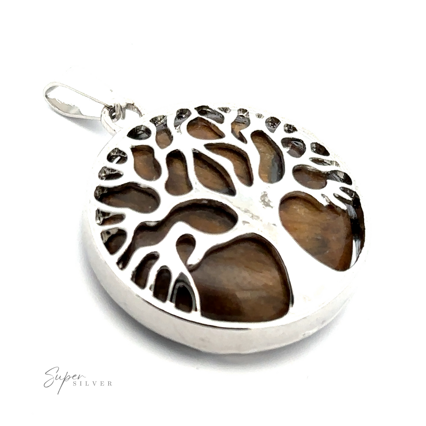 
                  
                    A round silver plated Tree of Life Pendant showcasing a tree design with brown gemstones embedded in the background, set against a white backdrop. The text "Super Silver" is visible in the bottom left corner.
                  
                