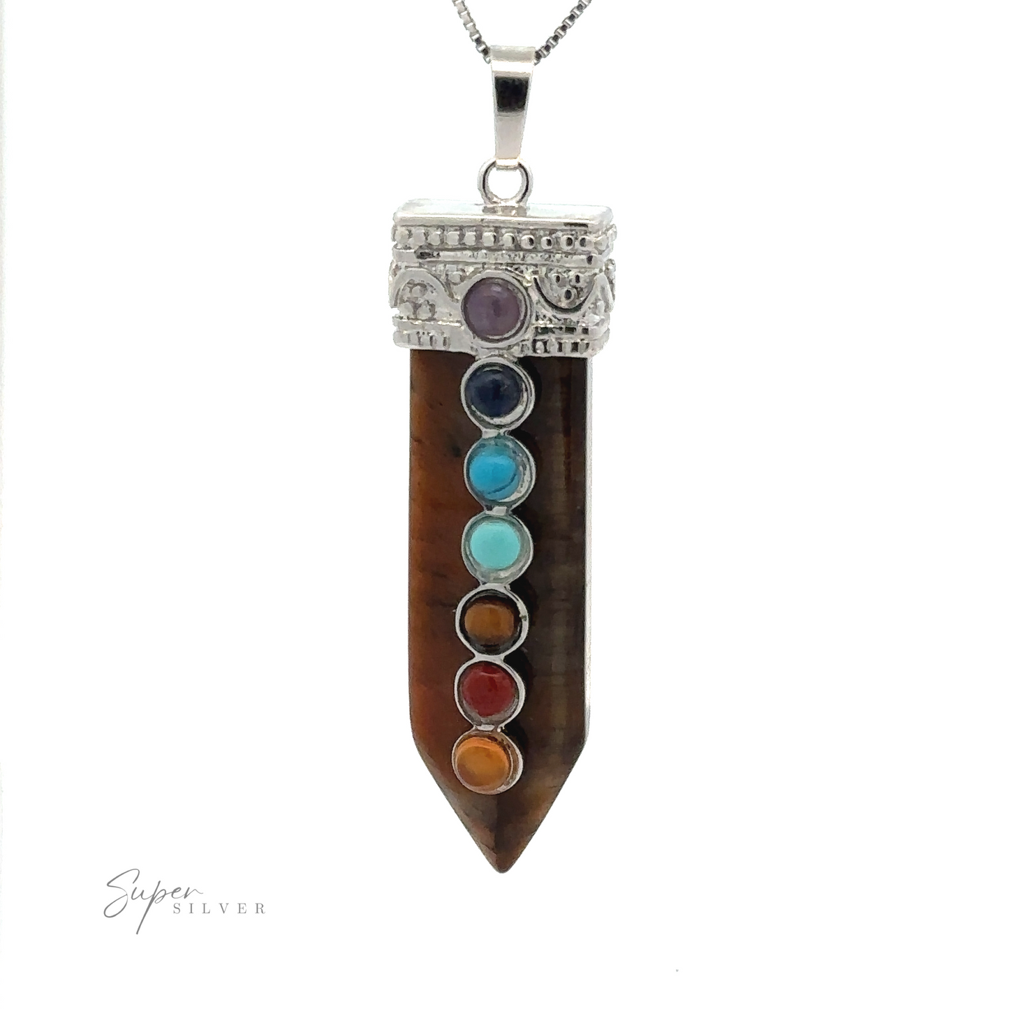 
                  
                    A stunning Obelisk Crystal Pendant with Small Chakra Stones featuring a pointed, multicolored stone with seven smaller chakra stones mounted in a straight line on its surface. The pendant is beautifully set on a silver-plated design.
                  
                