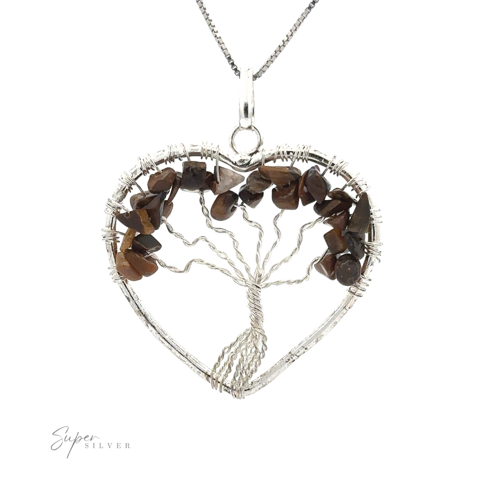 
                  
                    A Heart Shaped Tree of Life Pendant featuring a wire-crafted design adorned with raw stone beads as leaves.
                  
                