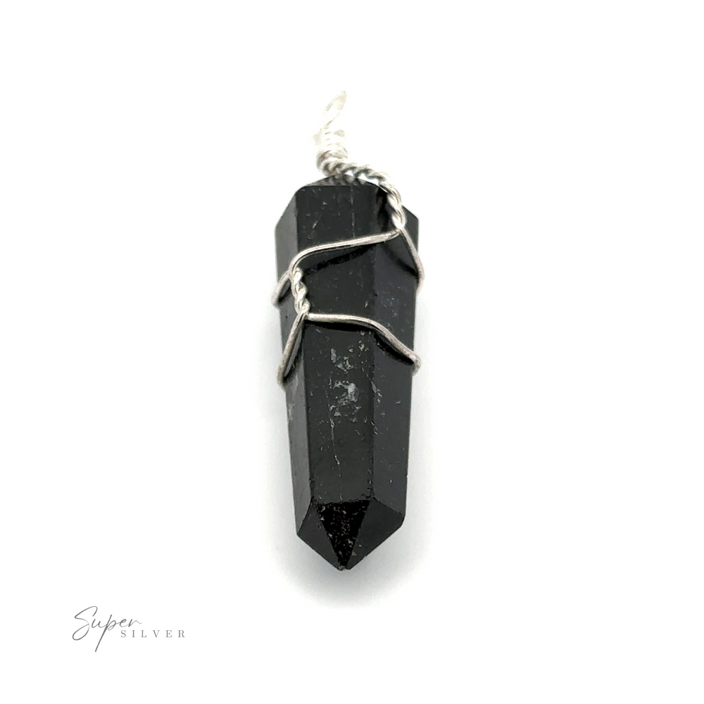 
                  
                    A striking black crystal pendant wrapped in silver wire, with the words "Wire Wrapped Stone Pendant" elegantly printed in the bottom left corner, exudes a captivating aura akin to that of Quartz.
                  
                