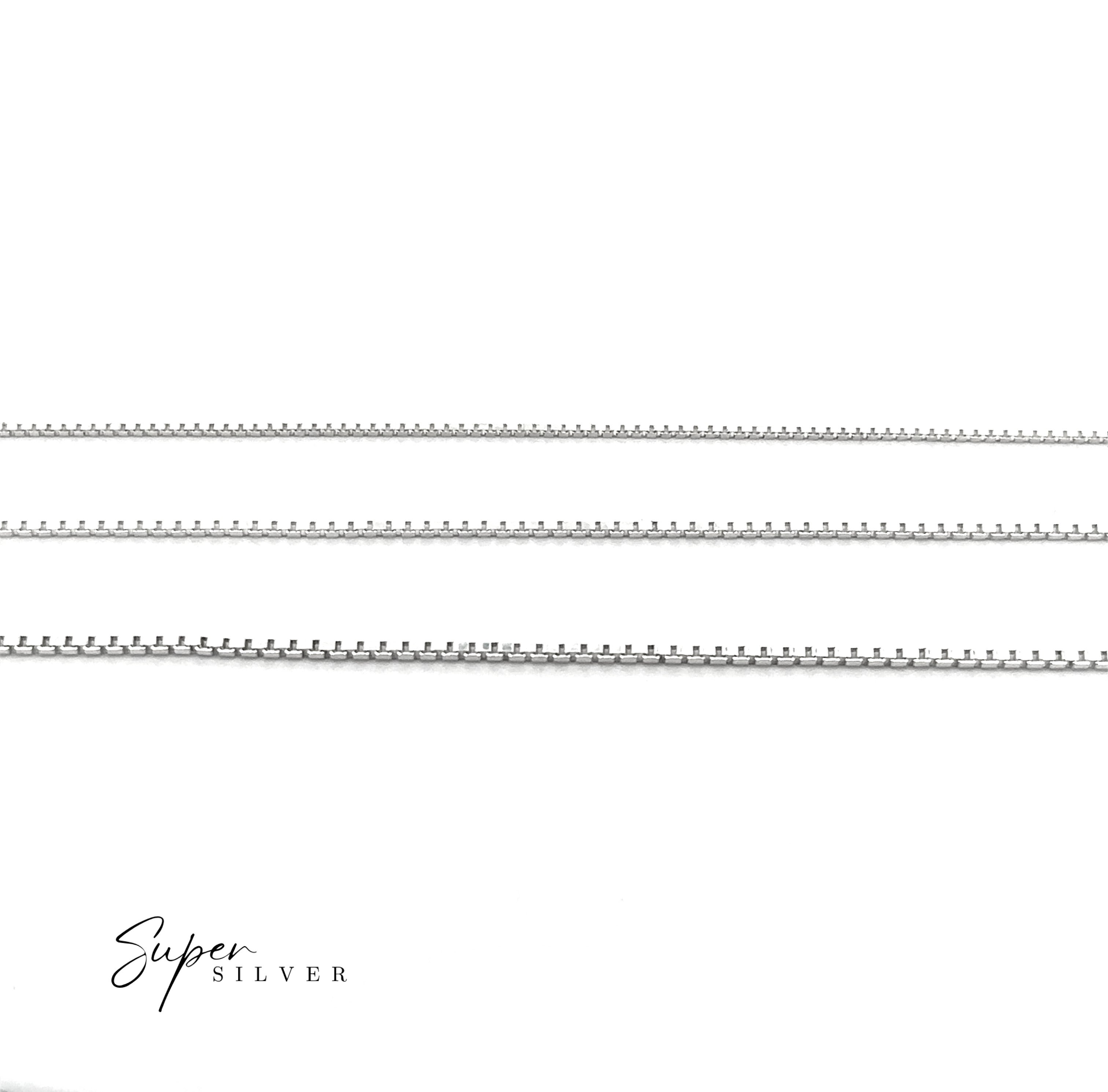 Three Delicate Sterling Silver D/C Box Chains shimmer on a white background, aligned horizontally. "Super Silver" appears in the lower left corner, emphasizing the elegance and craftsmanship of these Italian-made chains.
