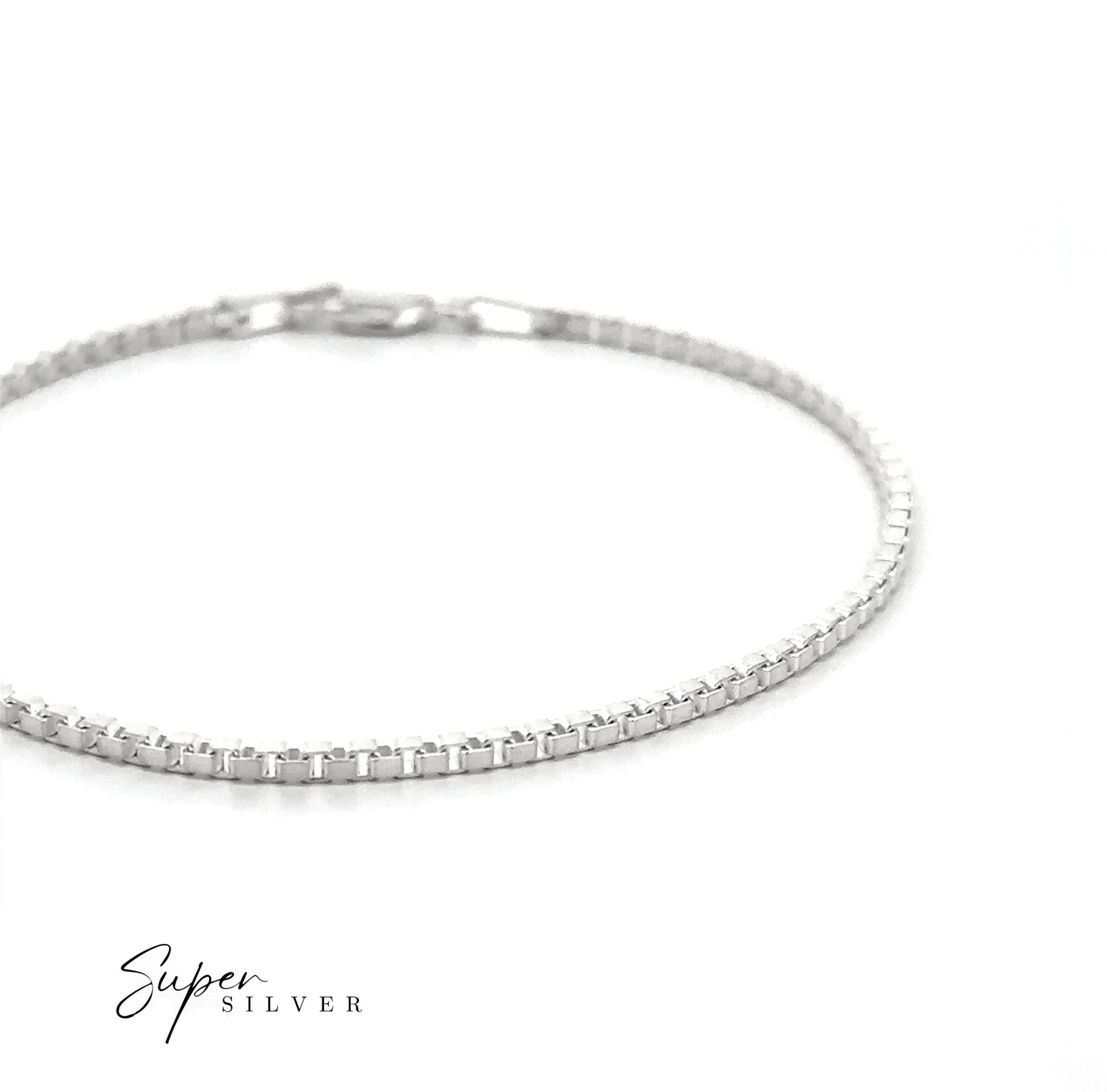 The Bold Italian Box Chain bracelet with a box clasp is shown on a white background. The "Super Silver" logo in the lower left corner highlights this minimalist jewelry piece.
