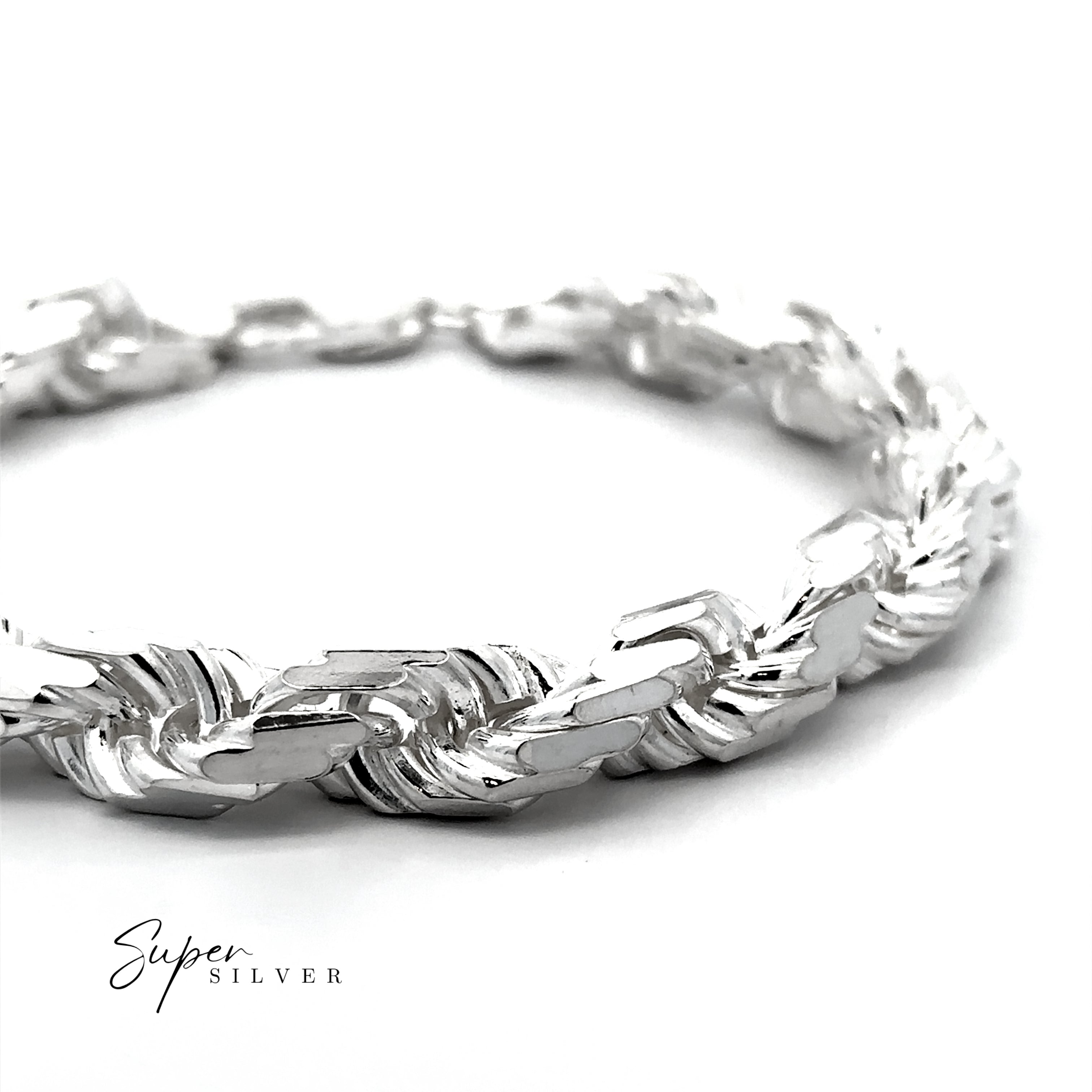 A close-up of the Huge Italian D/C Rope Chain bracelet with a woven silver design shown on a white background, featuring "Super Silver" in the lower left corner.