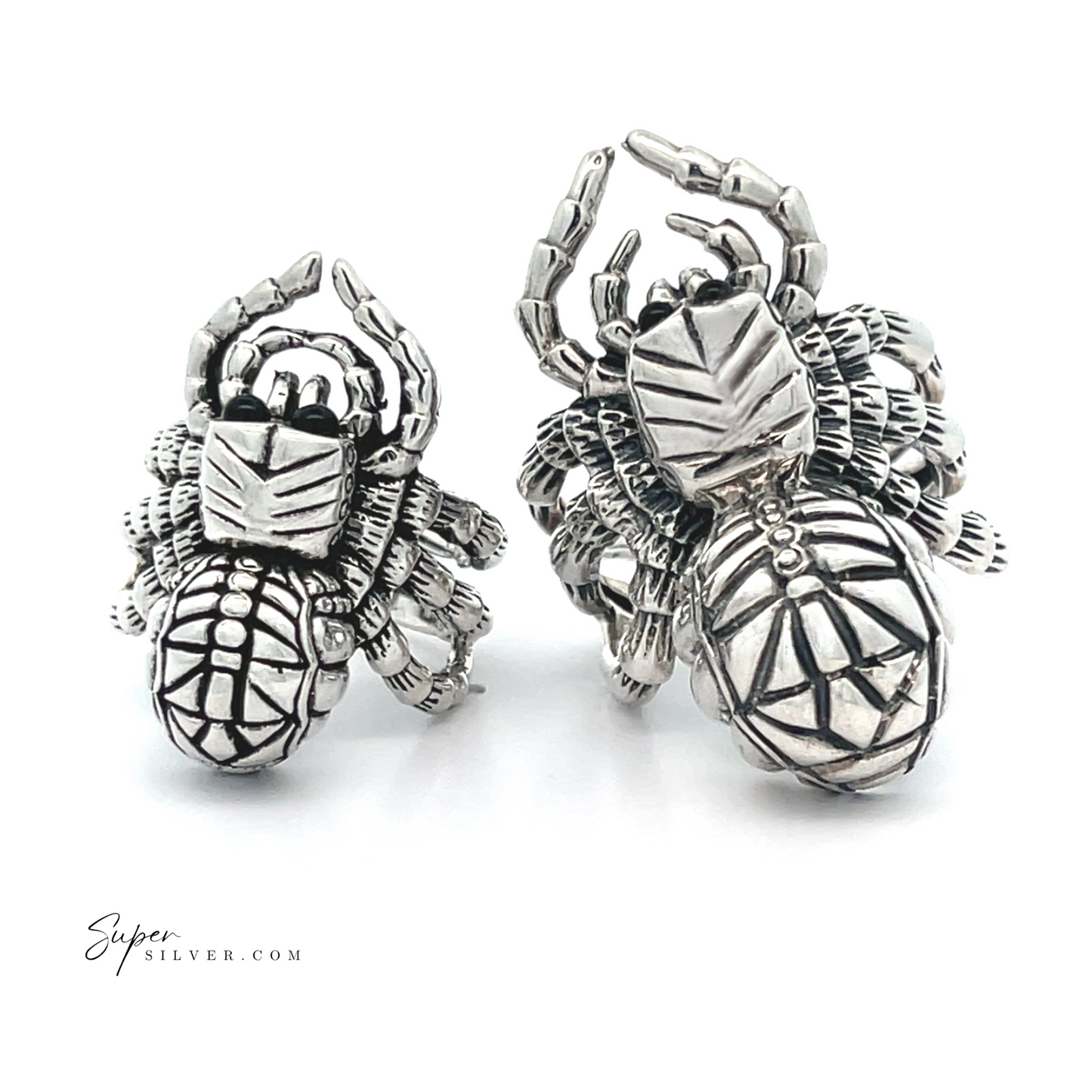 Two intricately designed Adjustable Statement Spider Rings, crafted from sterling silver with detailed patterns and a polished finish, showcasing fine handcrafted jewelry artistry.