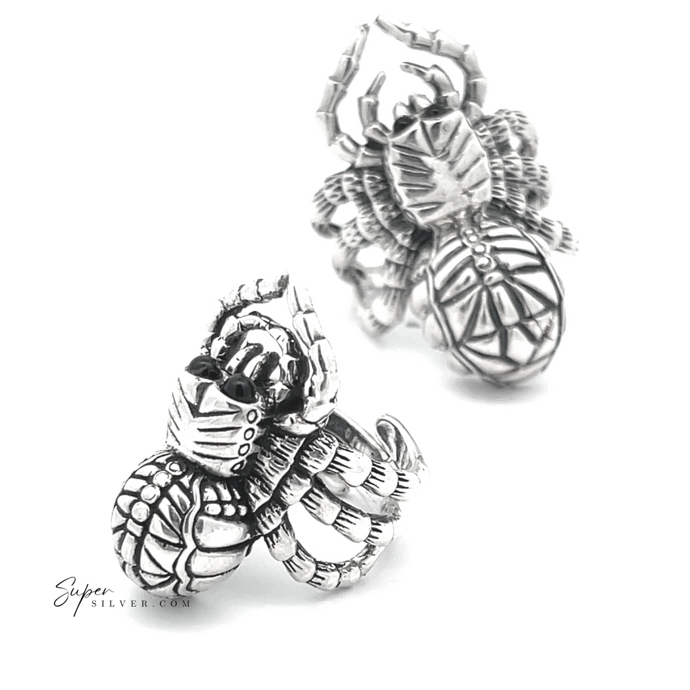 
                  
                    The Adjustable Statement Spider Rings in Sterling Silver exhibit intricate details, epitomizing handcrafted jewelry excellence. Displayed on a pristine white background, these exquisite pieces perfectly capture the essence of artistry and elegance.
                  
                