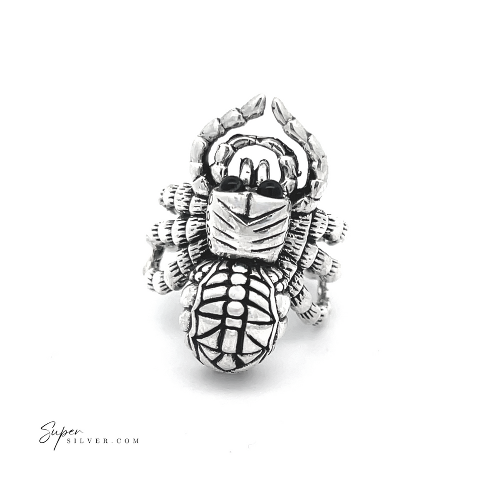 
                  
                    Adjustable statement spider ring with intricate textures and engravings, showcased on a white background, exemplifying the artistry of handcrafted jewelry.
                  
                