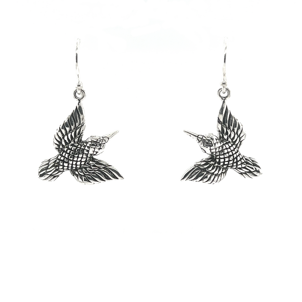 
                  
                    A pair of Super Silver Detailed Hummingbird Earrings on a white background.
                  
                