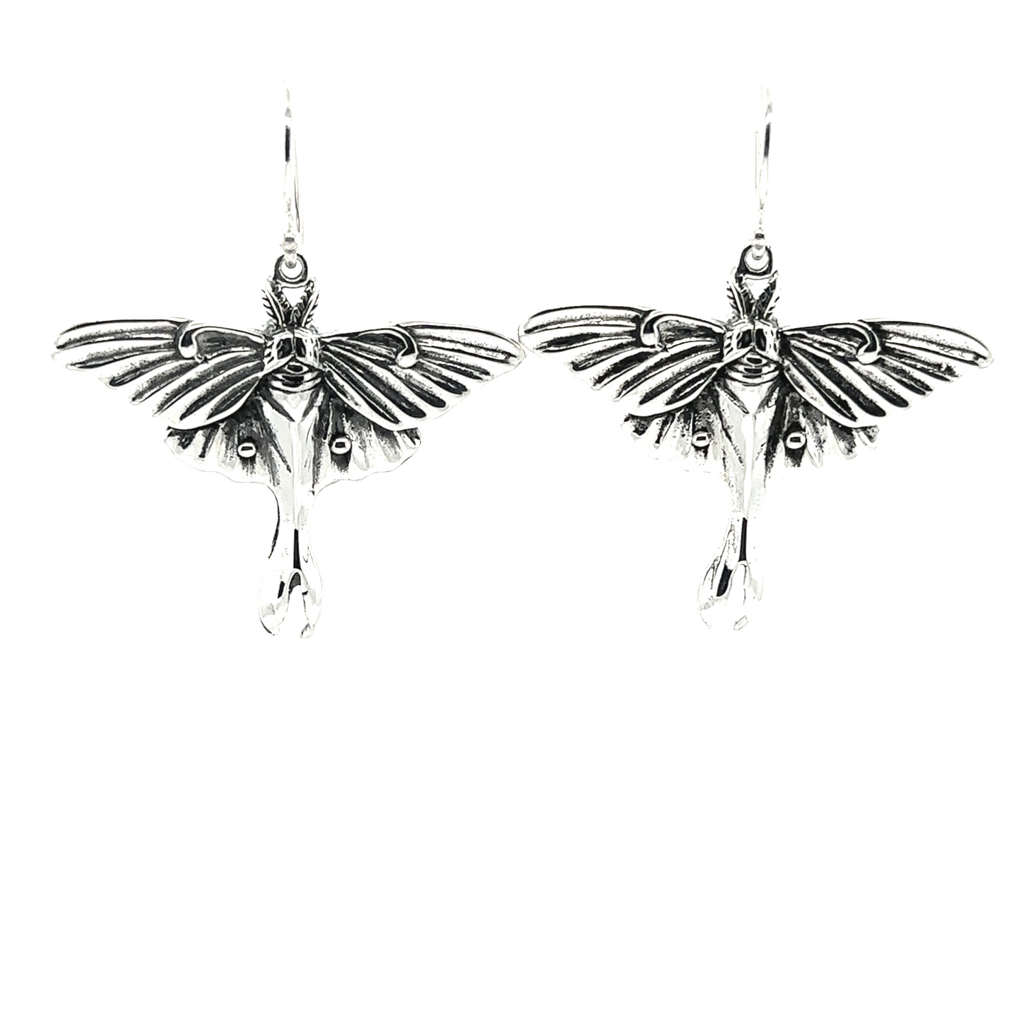 A pair of Super Silver Statement Lunar Moth Earrings on a white background, exuding enchantment.