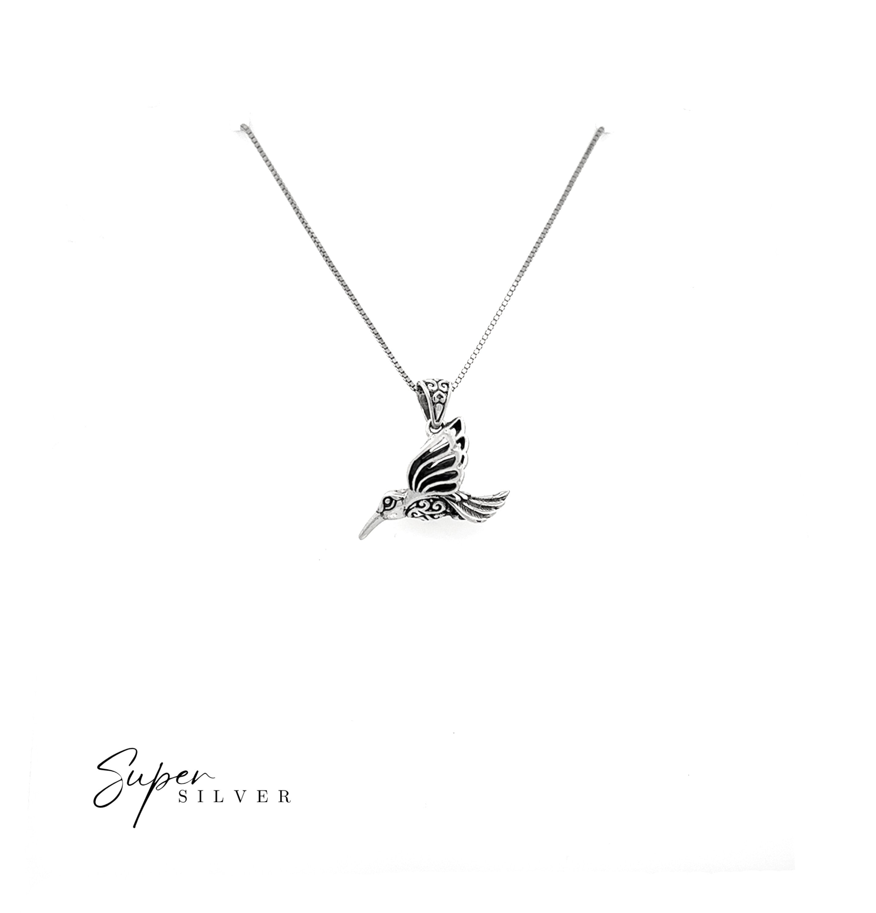 Filigree Humming Bird Pendant