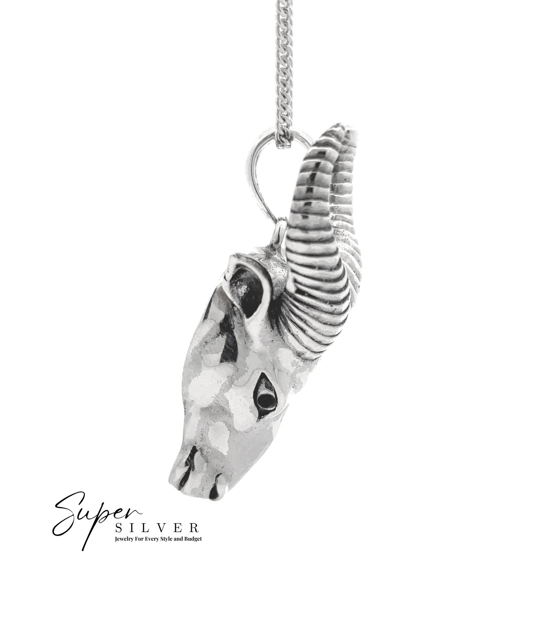 The Ram Statement Pendant is a sterling silver necklace with a detailed ram’s head and curved horns, shown on a plain white background. Ideal for gothic jewelry fans. The "Super Silver" logo appears in the bottom left corner.