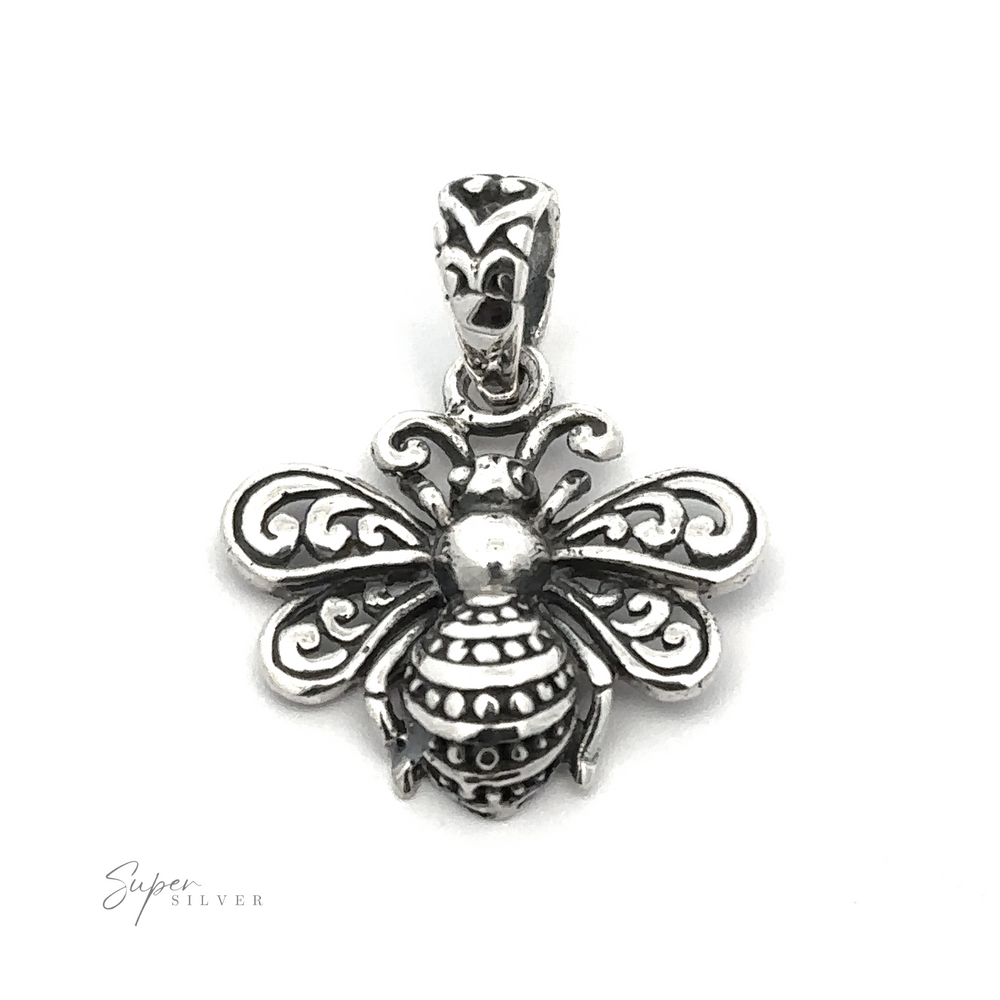 
                  
                    A detailed, silver Filigree Bee Pendant with ornate patterns on its wings and body. The pendant hook also has intricate designs. The text "Super Silver .925 Sterling Silver" is visible at the bottom left corner.
                  
                