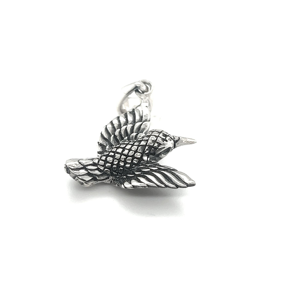 An artisan-crafted Super Silver Detailed Hummingbird Pendant on a white background.