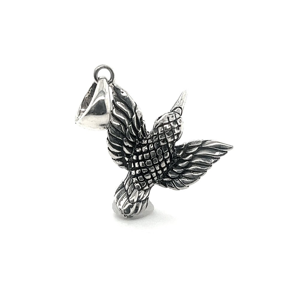 An artisan Detailed Hummingbird Pendant with an oxidized finish on a white background, by Super Silver.