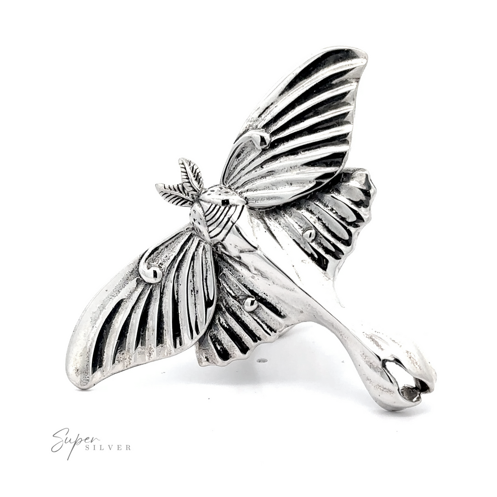 
                  
                    Statement Lunar Moth Ring designed as a stylized butterfly with detailed wings and body, crafted from sterling silver, displayed on a white background.
                  
                