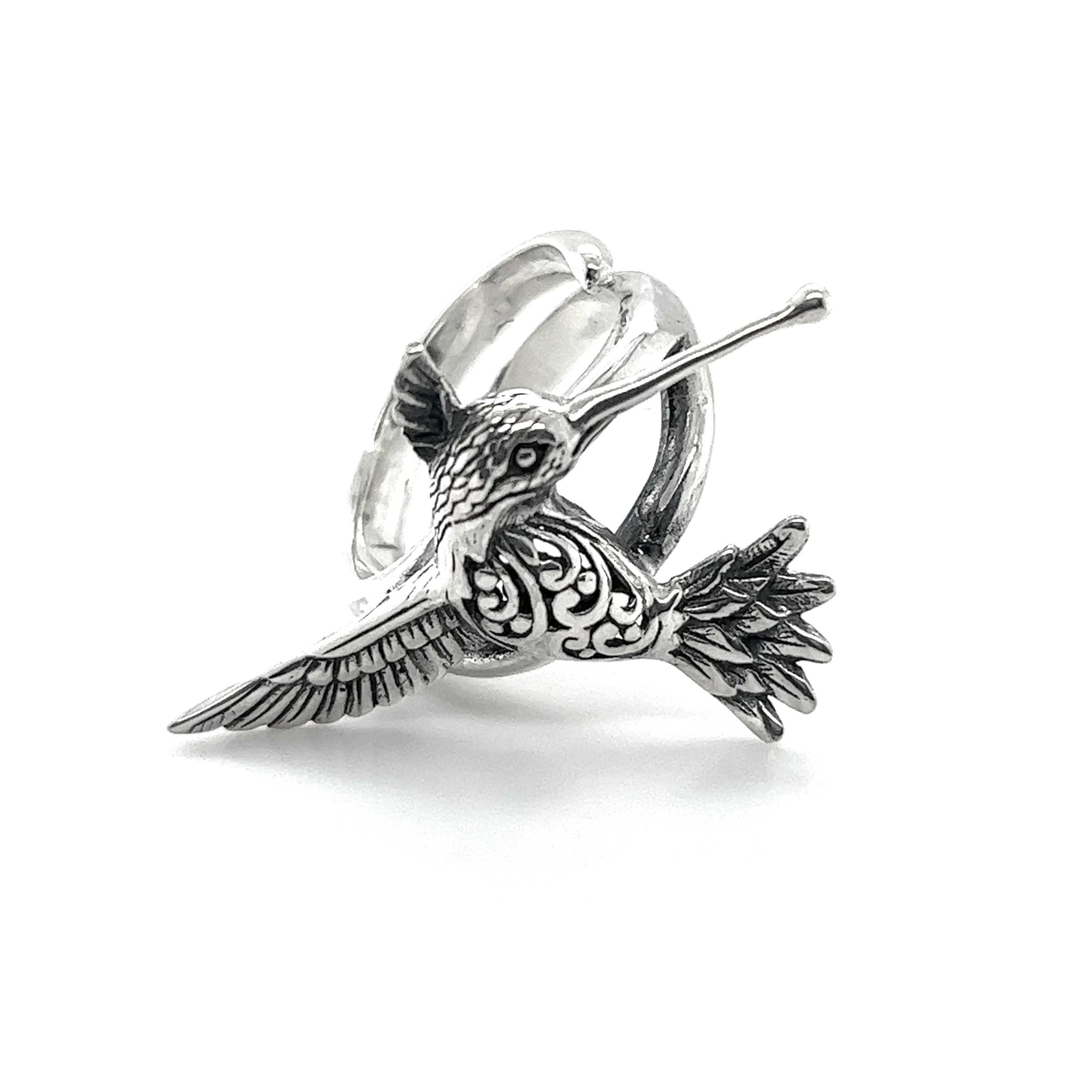 An adjustable silver Filigree Hummingbird Ring with filigree design on a white background.