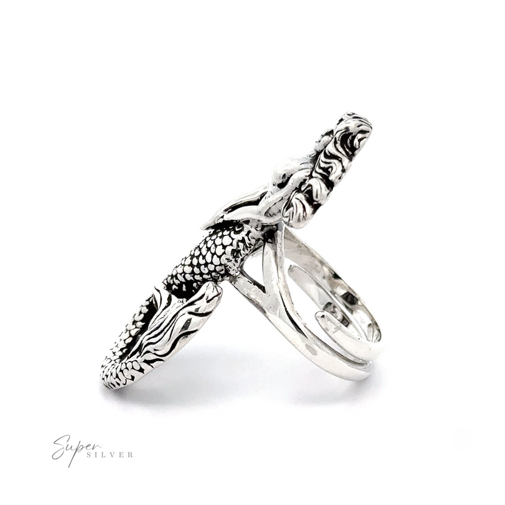 
                  
                    Statement Adjustable Mermaid Ring featuring a detailed Large Mermaid design, displayed on a white background. The mermaid's tail and scales are intricately crafted.
                  
                