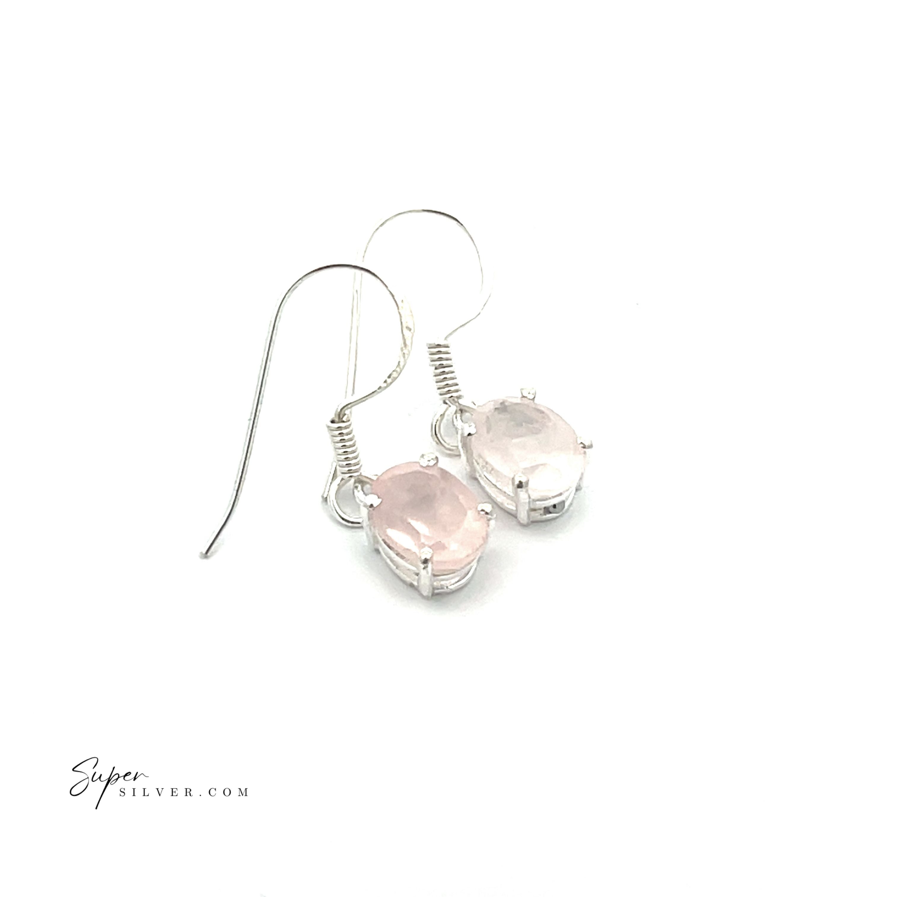 Brilliant Oval Gemstone Earrings in sterling silver with light pink oval-cut stones are displayed on a white background, featuring the text "supersilver.com" in the corner.