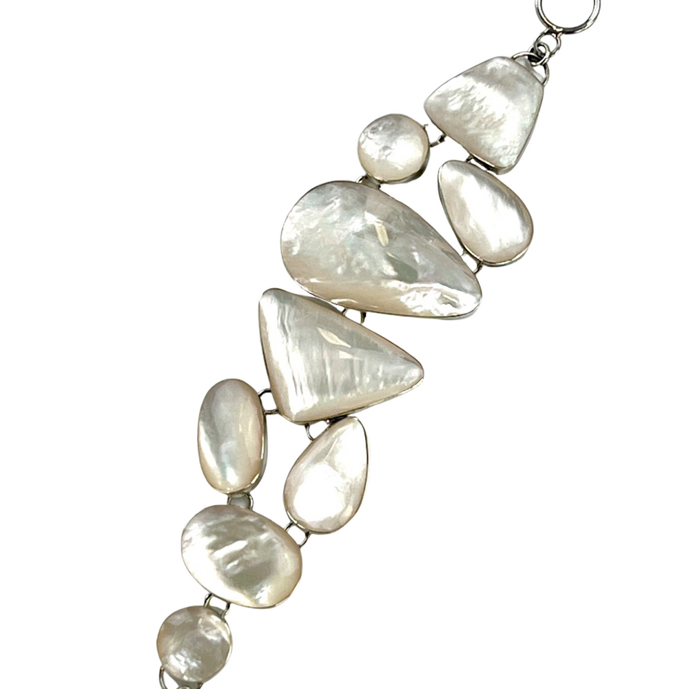 
                  
                    A luminous white Statement Mother of Pearl Bracelet on a Super Silver chain.
                  
                