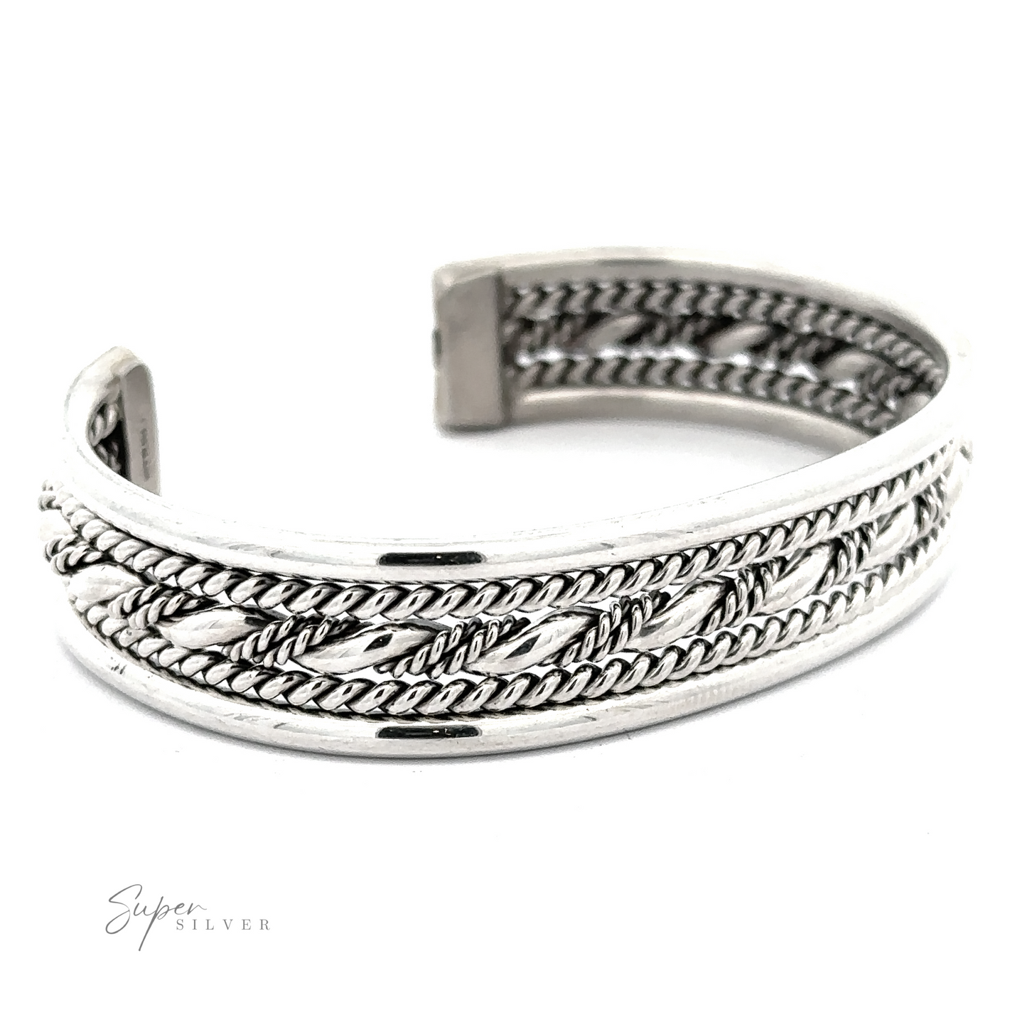 A silver cuff bracelet featuring a braided rope design and engraved pattern. Crafted in .925 Sterling Silver, the Native American Handmade Intricate Silver Cuff is partially open and has a polished finish, with the text "Super Silver" visible in the corner. The 11mm width adds to its elegant presence.