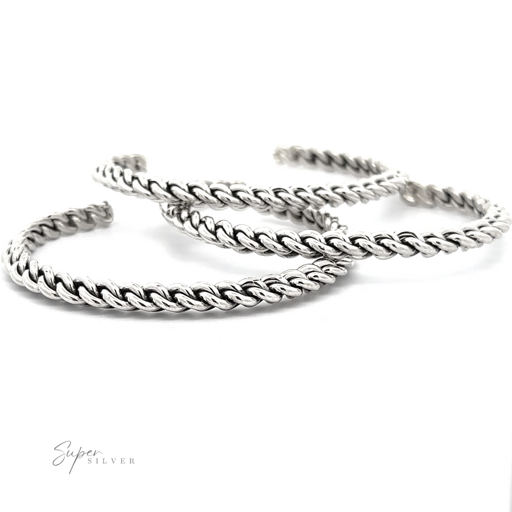
                  
                    Three Native American Handmade Silver Woven Link Bracelets are arranged in a semi-circle, overlapping each other slightly on a plain white background. The word "Super Silver" is written in the bottom left corner, highlighting these exquisite stacking bracelets.
                  
                