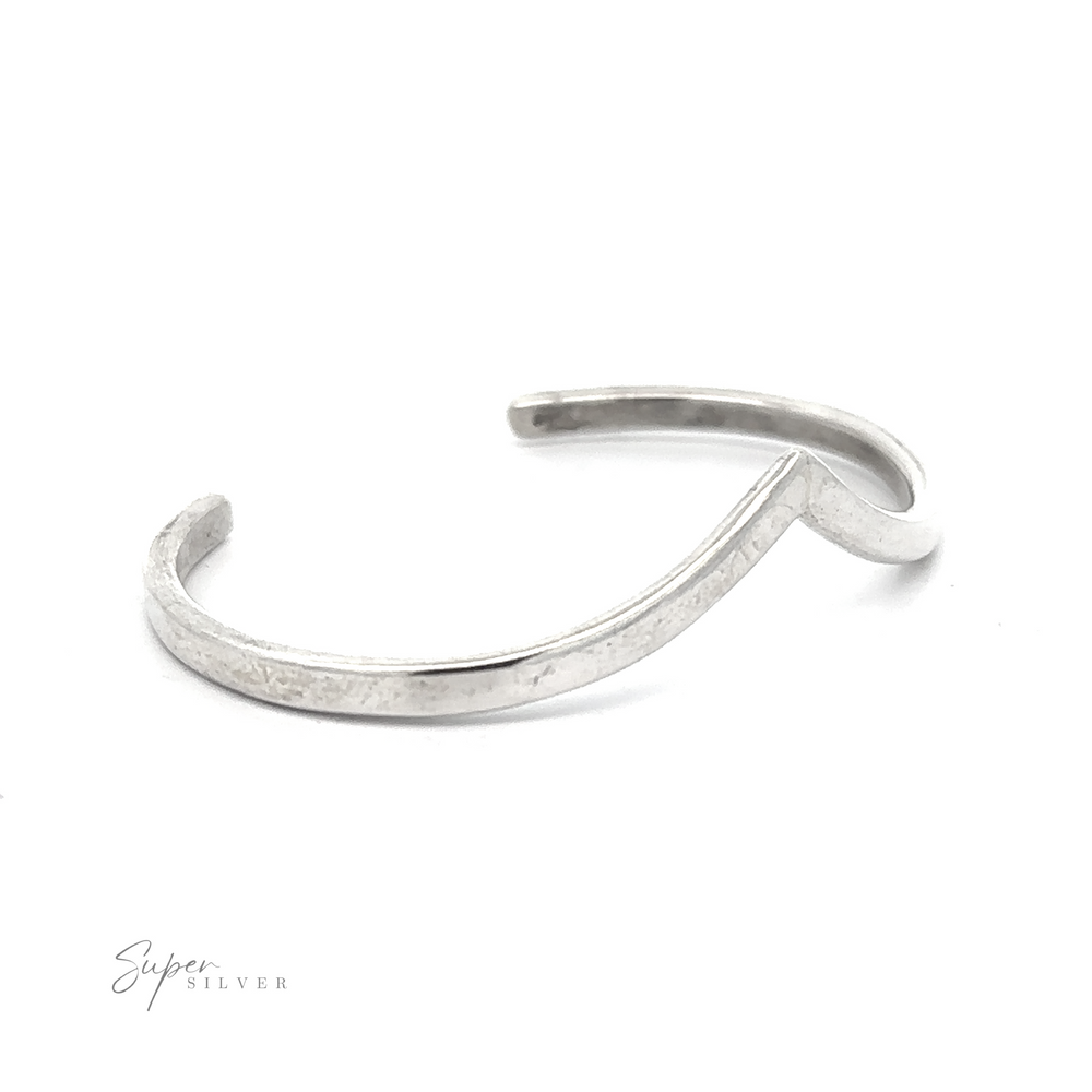 
                  
                    Image of an open Native American Handmade Silver Chevron Cuff on a white background. The handmade bracelet features simple, smooth lines. The "Super Silver" logo is visible in the bottom left corner.
                  
                