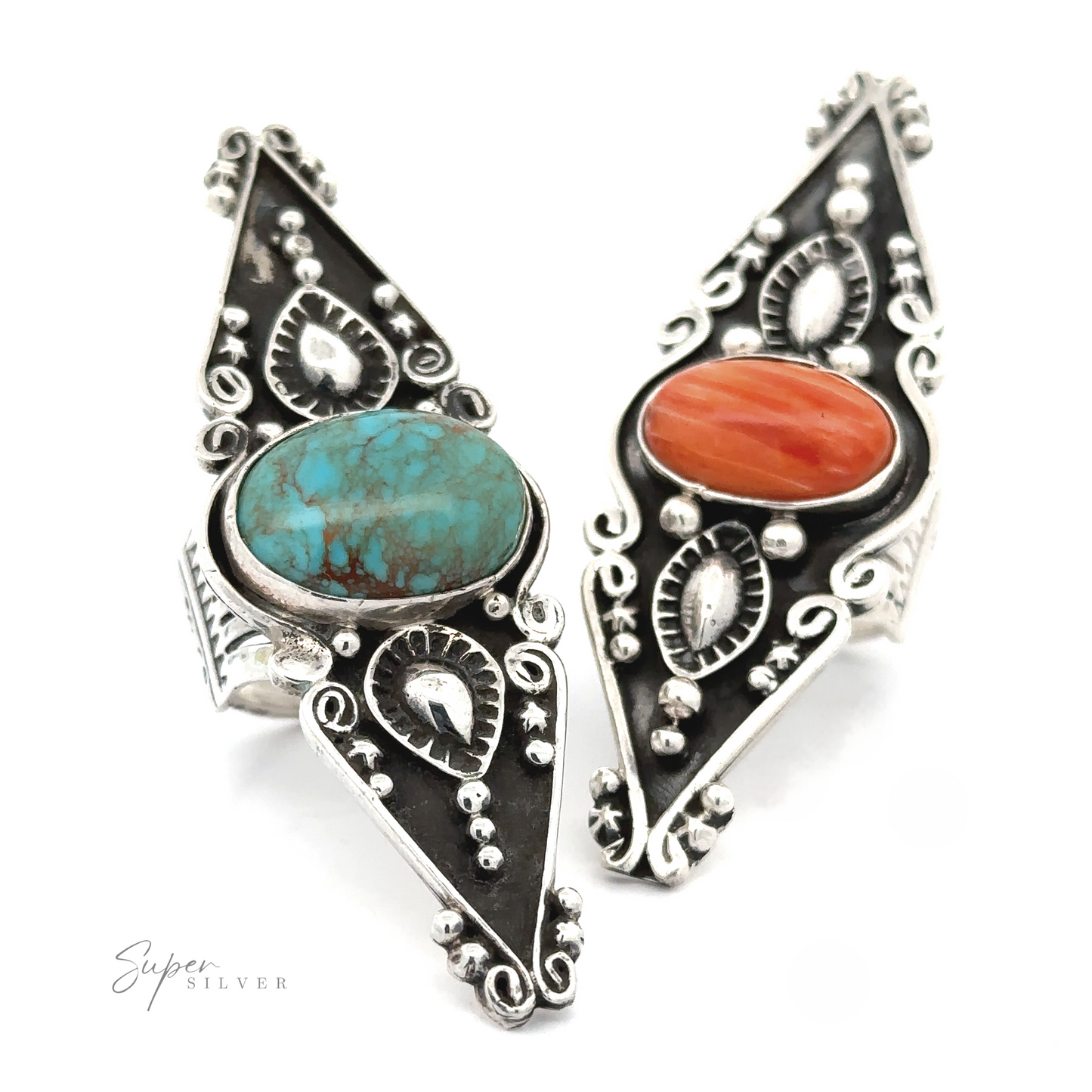 Pair of Stunning Native American Statement Rings with ornate Southwest artistry, each featuring a large turquoise and a smaller coral stone.
