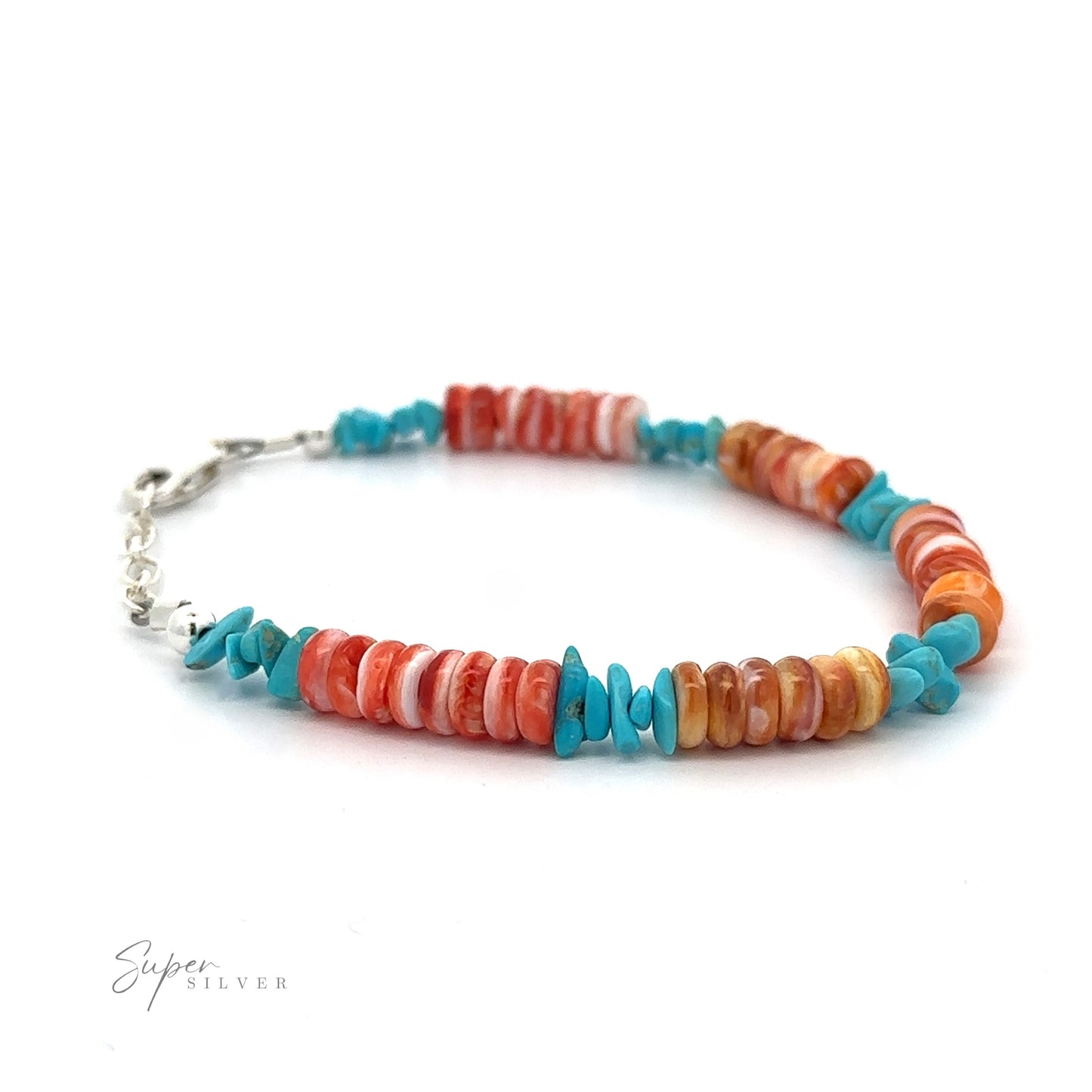 A colorful Native American Turquoise and Spiny Oyster Shell Bracelet with alternating red and turquoise beads and a silver clasp on a white background.