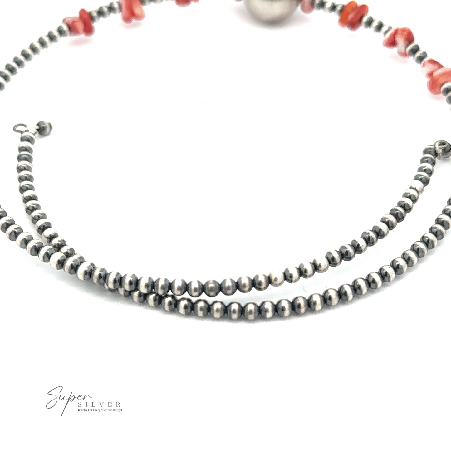 
                  
                    A Wrap Around Spiny Oyster Shell Choker Necklace featuring small silver beads and red coral chunks, reminiscent of Navajo pearls, shown against a white background, with the text "Super Silver" in the bottom left corner.
                  
                