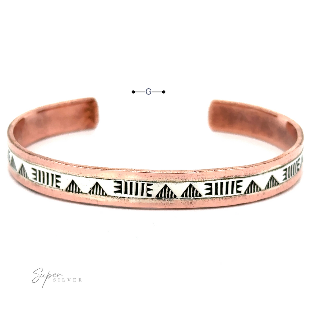 
                  
                    A Native American Handmade Copper And Silver Bracelet with a white enamel segment featuring black geometric patterns is displayed on a white background. The logo "Super Silver" is visible in the bottom left corner, showcasing its handcrafted quality akin to a Native American Cuff Bracelet.
                  
                