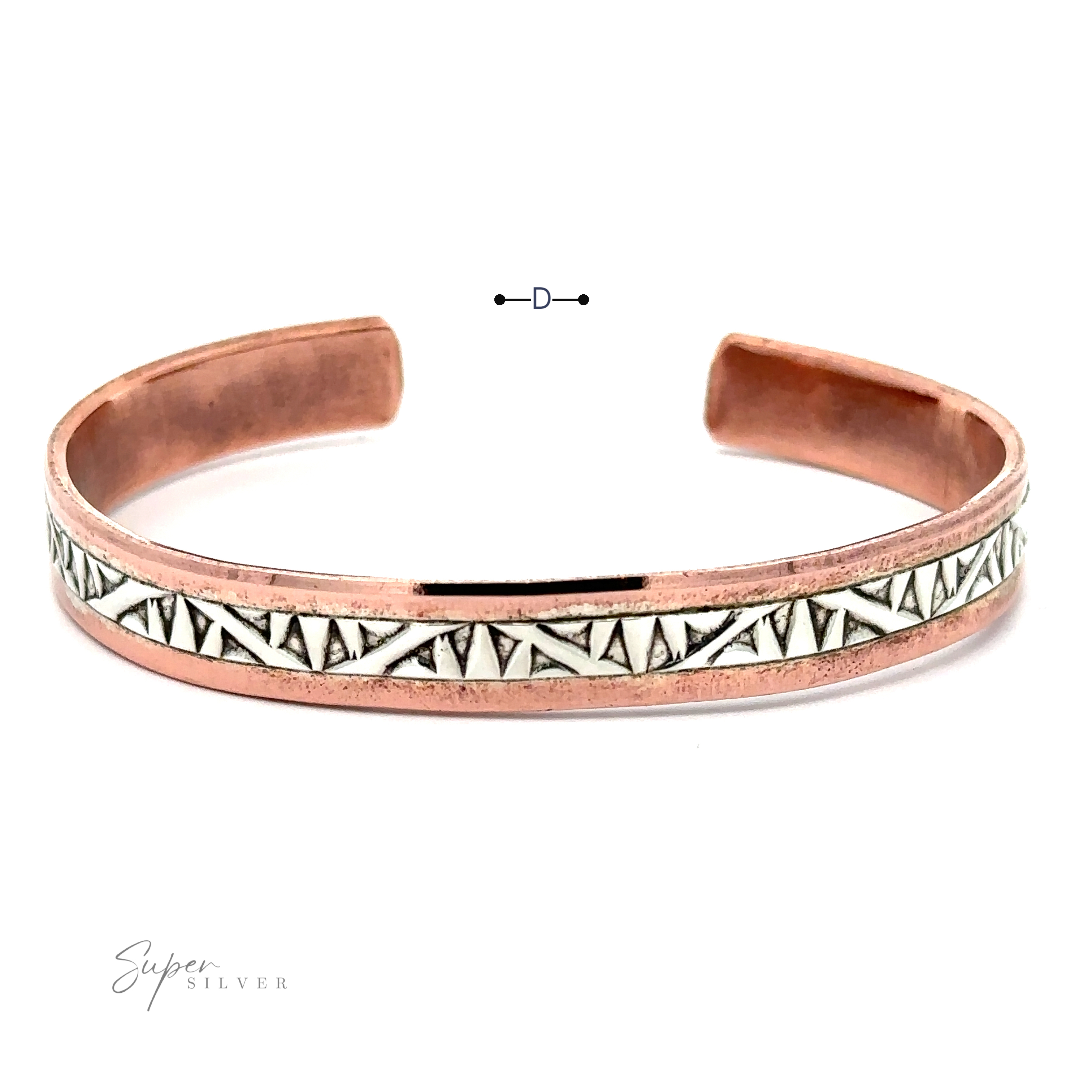 A Native American Handmade Copper And Silver Bracelet with an engraved white and black geometric pattern, featuring a small "Super Silver" logo in the corner. This exquisite piece is reminiscent of a Native American Cuff Bracelet, blending artistry and heritage seamlessly.