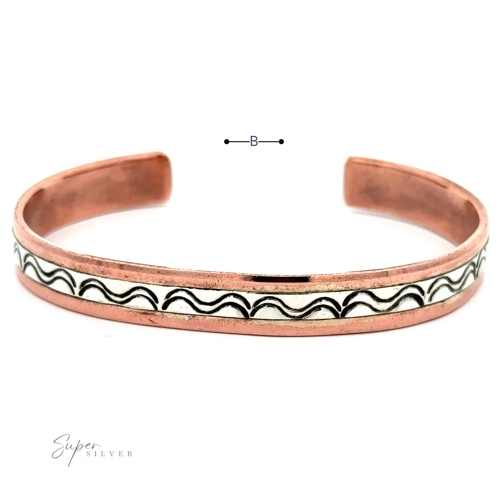 
                  
                    A beautifully crafted Native American Handmade Copper And Silver Bracelet with an engraved wavy pattern is shown against a white background. The brand "Super Silver" appears in the lower-left corner, highlighting its Native American handcrafted elegance.
                  
                