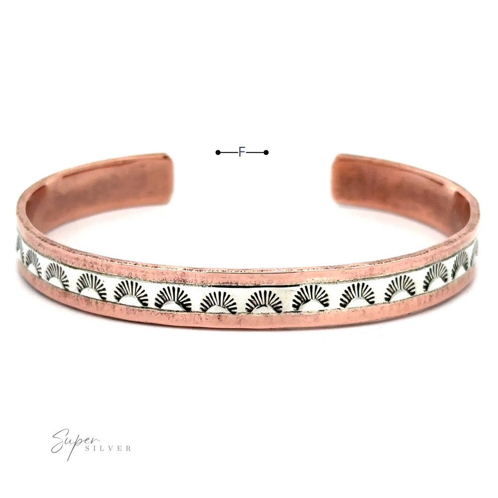 
                  
                    A Native American Handmade Copper And Silver Bracelet with an open end design. It features a decorative pattern in black on a lighter background along the center. The "Super Silver" logo is at the bottom left corner.
                  
                
