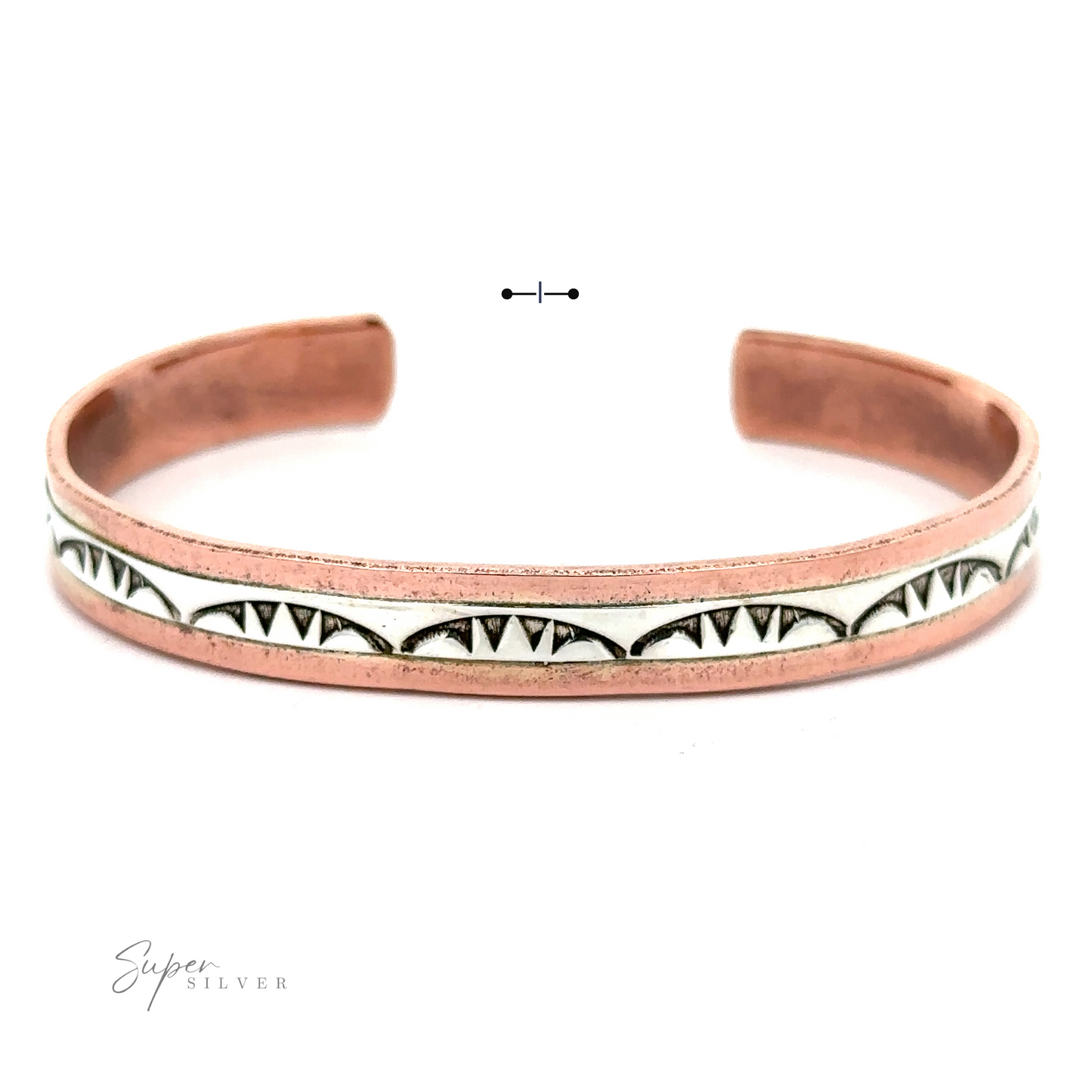 
                  
                    A Native American Handmade Copper And Silver Bracelet with an engraved pattern featuring triangular designs and a contrasting white inlay, inspired by Native American handcrafted artistry.
                  
                