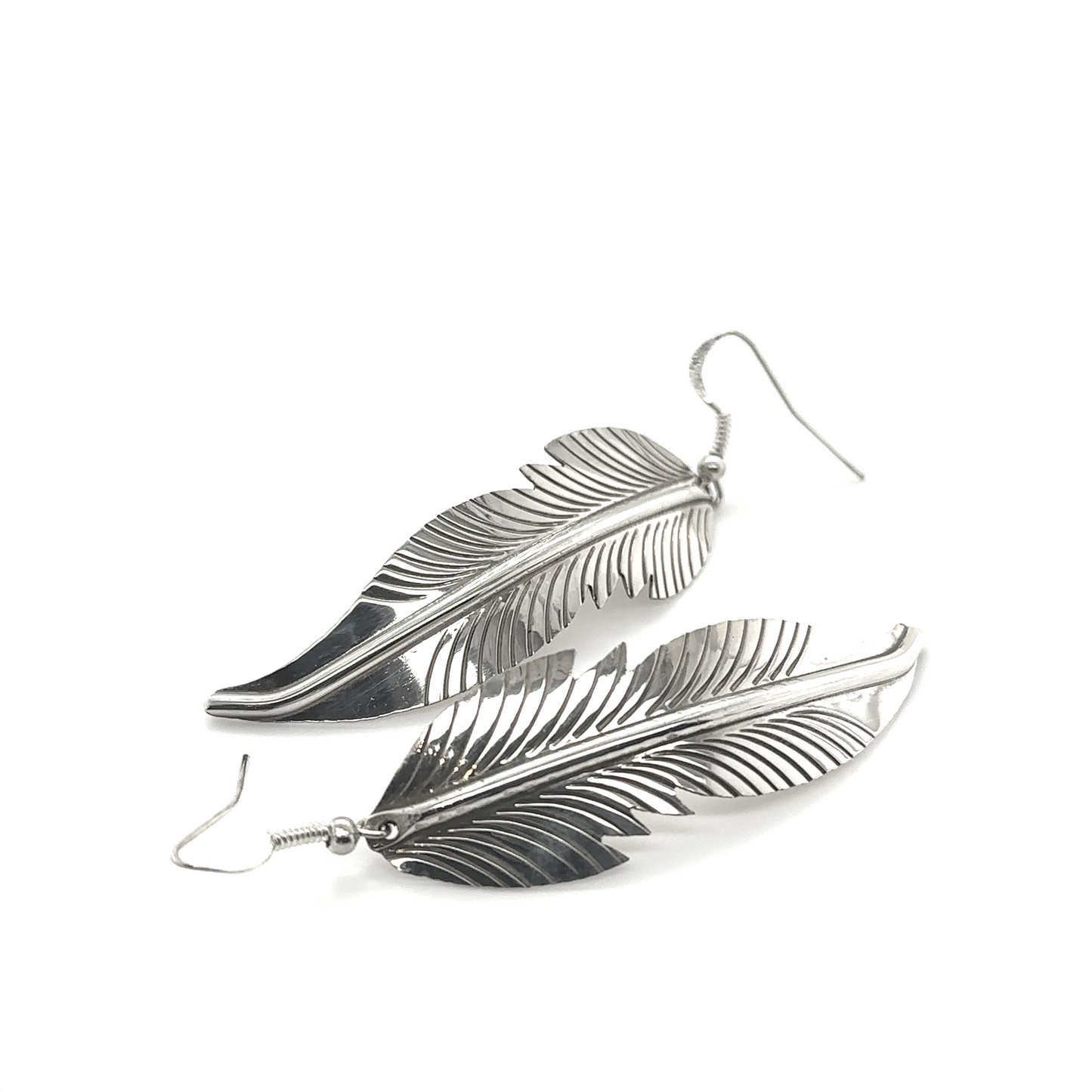 
                  
                    Striking Native American Feather Earrings by Super Silver on a white background.
                  
                
