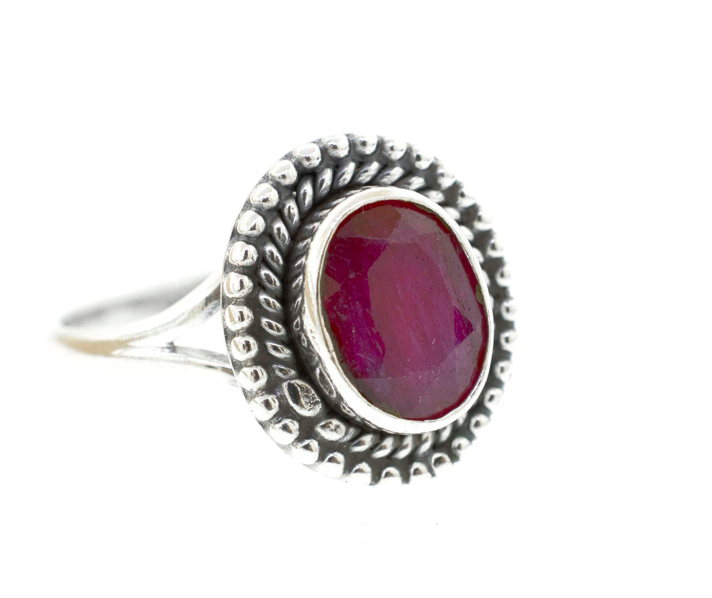 
                  
                    A silver Gemstone Oval Shield Ring with a ruby cabochon stone.
                  
                