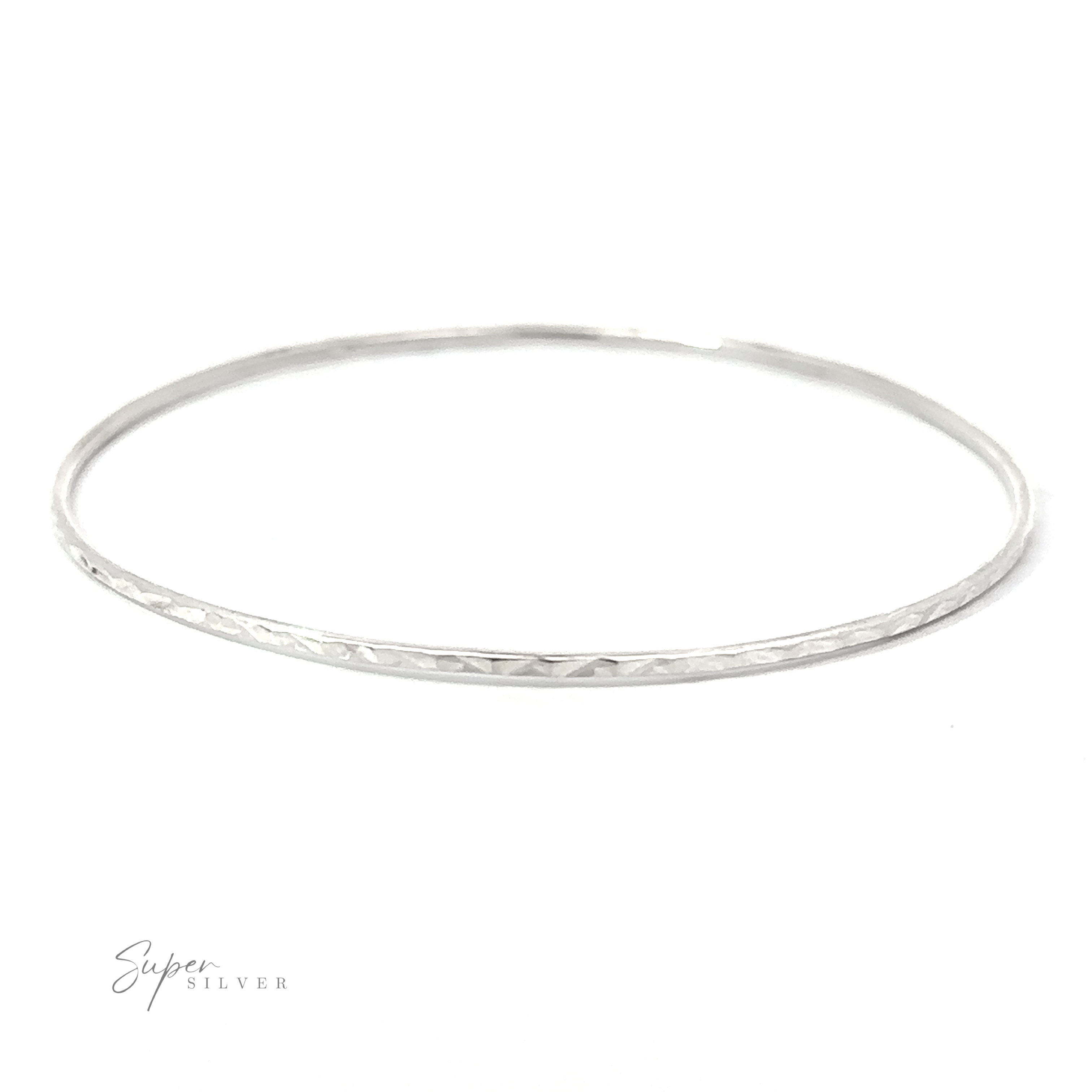 A Sparkling Faceted Bangle Bracelet with a hammered finish, exuding a minimal vibe.