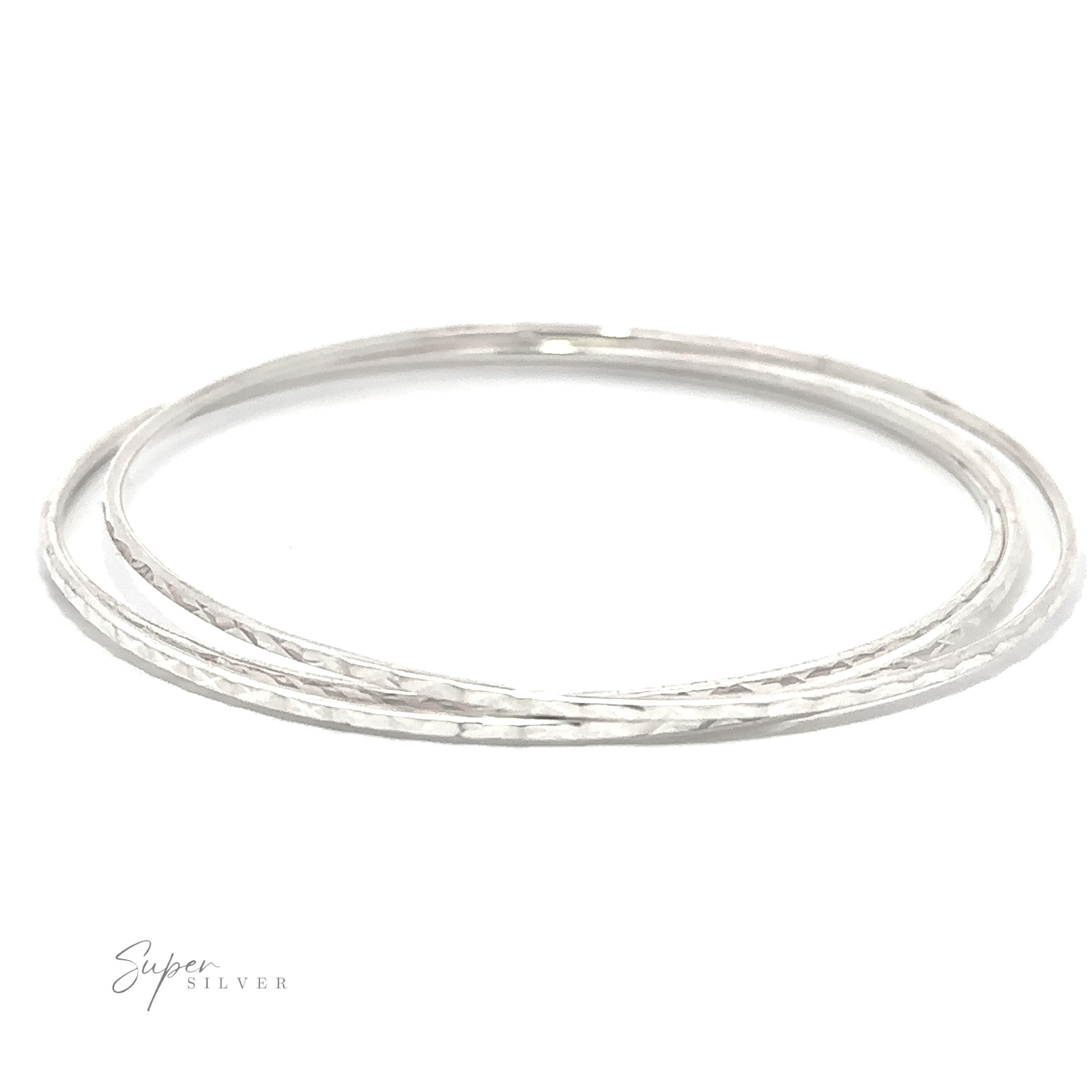A pair of Sparkling Faceted Bangle Bracelets with a minimal vibe on a white background.