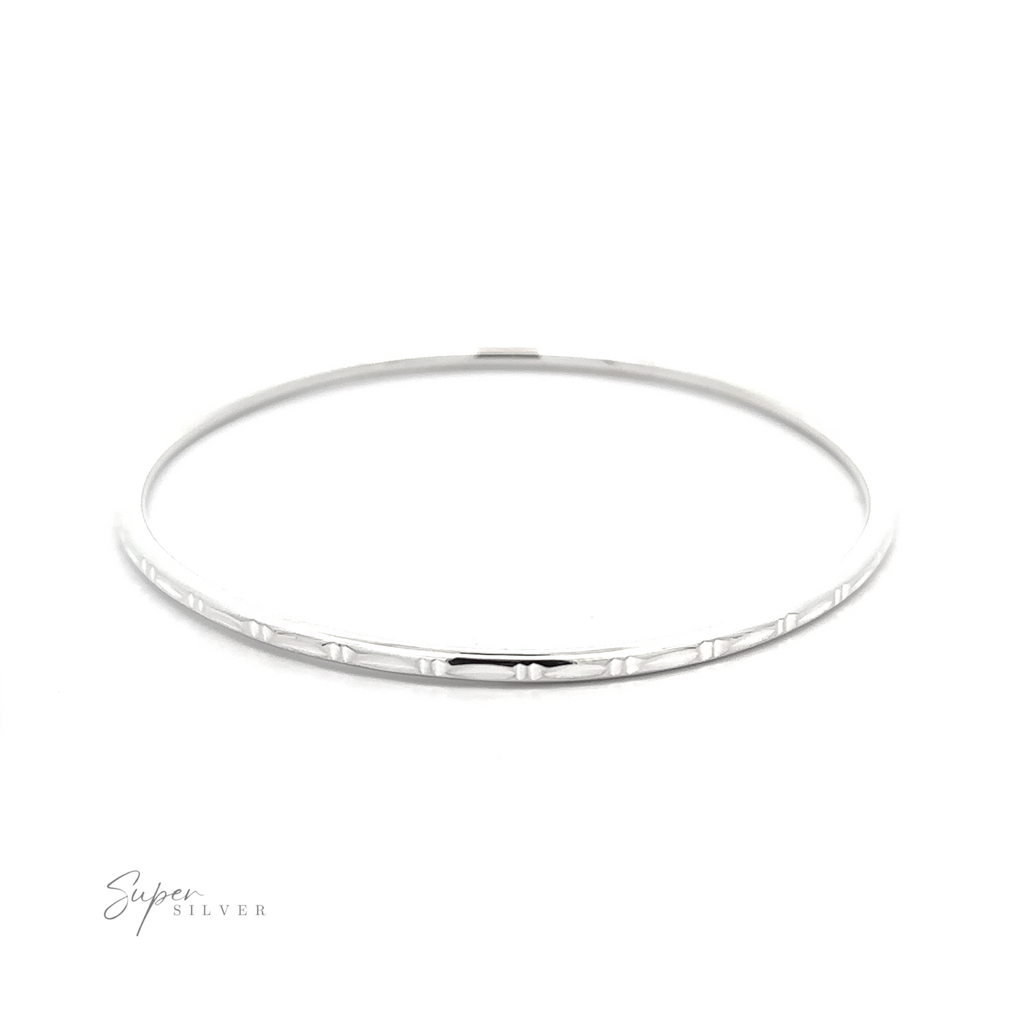 A Silver Bangle Bracelet with Faceted Cut with a bamboo facet cut design on a white background.