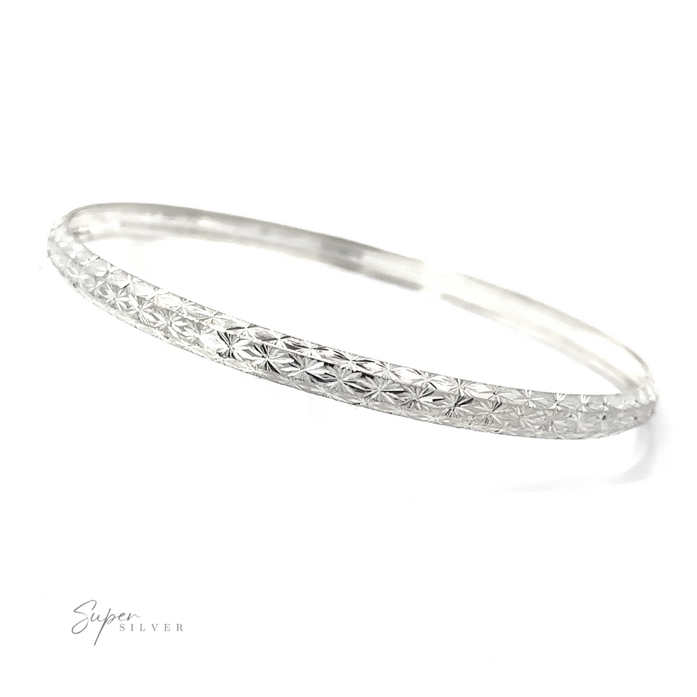 
                  
                    A stunning Elegant Etched Bangle Bracelet with a textured pattern that sparkles in the light, a truly unique find.
                  
                