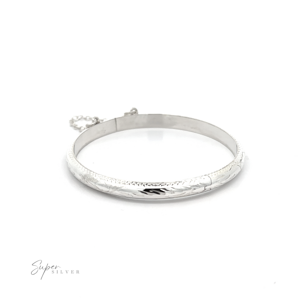 A Kids Etched Latched Bangle featuring a silver chain that makes taking it on and off easier.