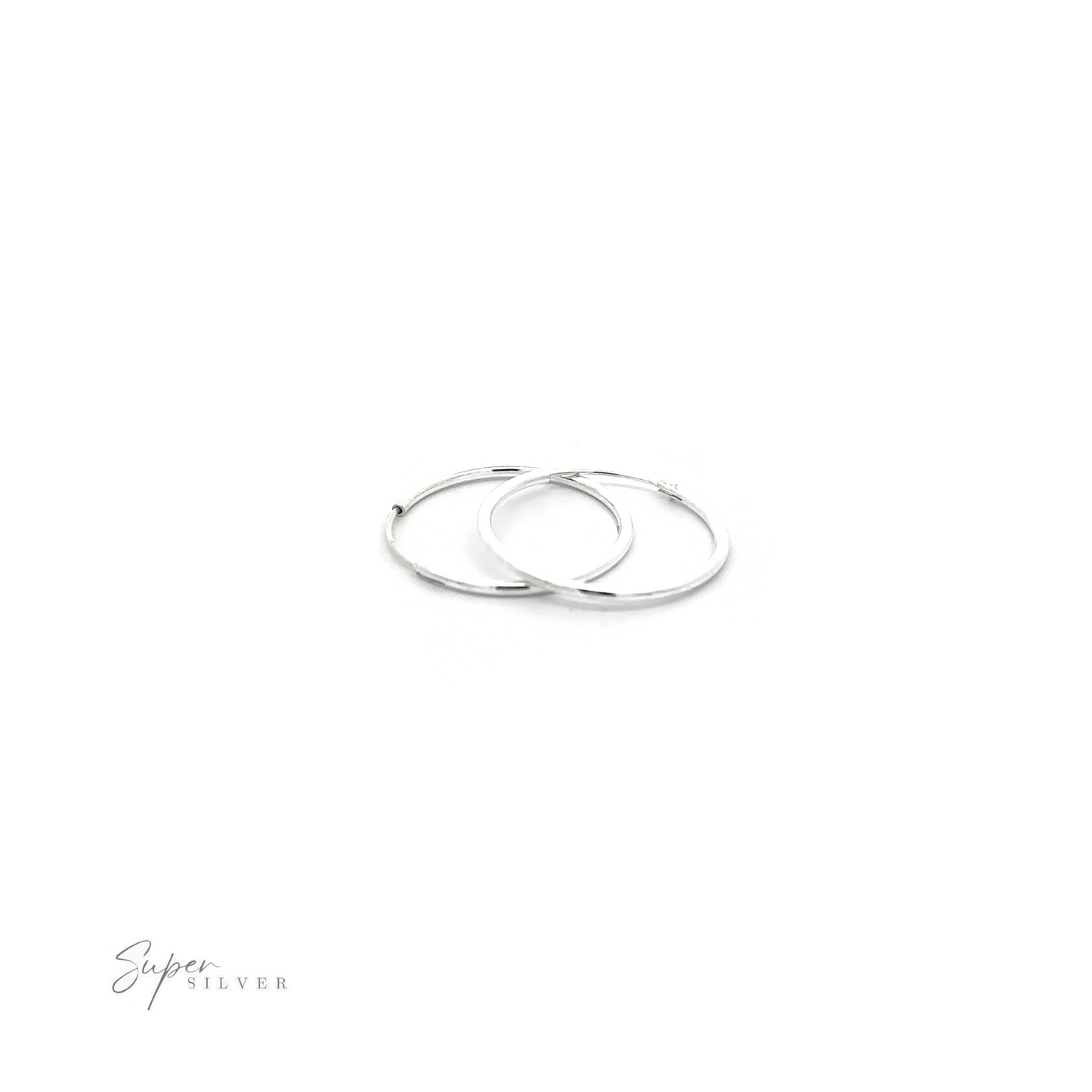 
                  
                    Two 1.5mm Infinity Hoops with minimalist flair on a white background.
                  
                