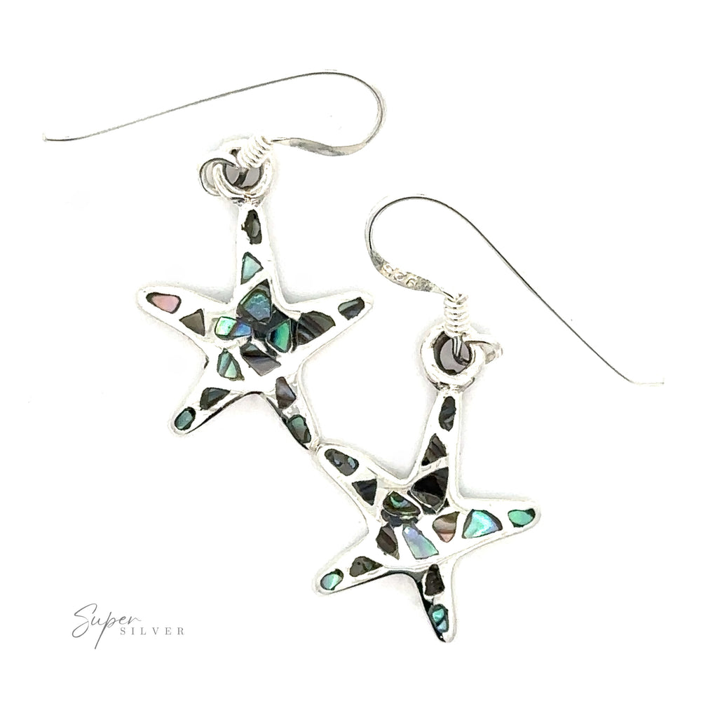 A pair of Abalone Shell Starfish Earrings, displayed against a white background.