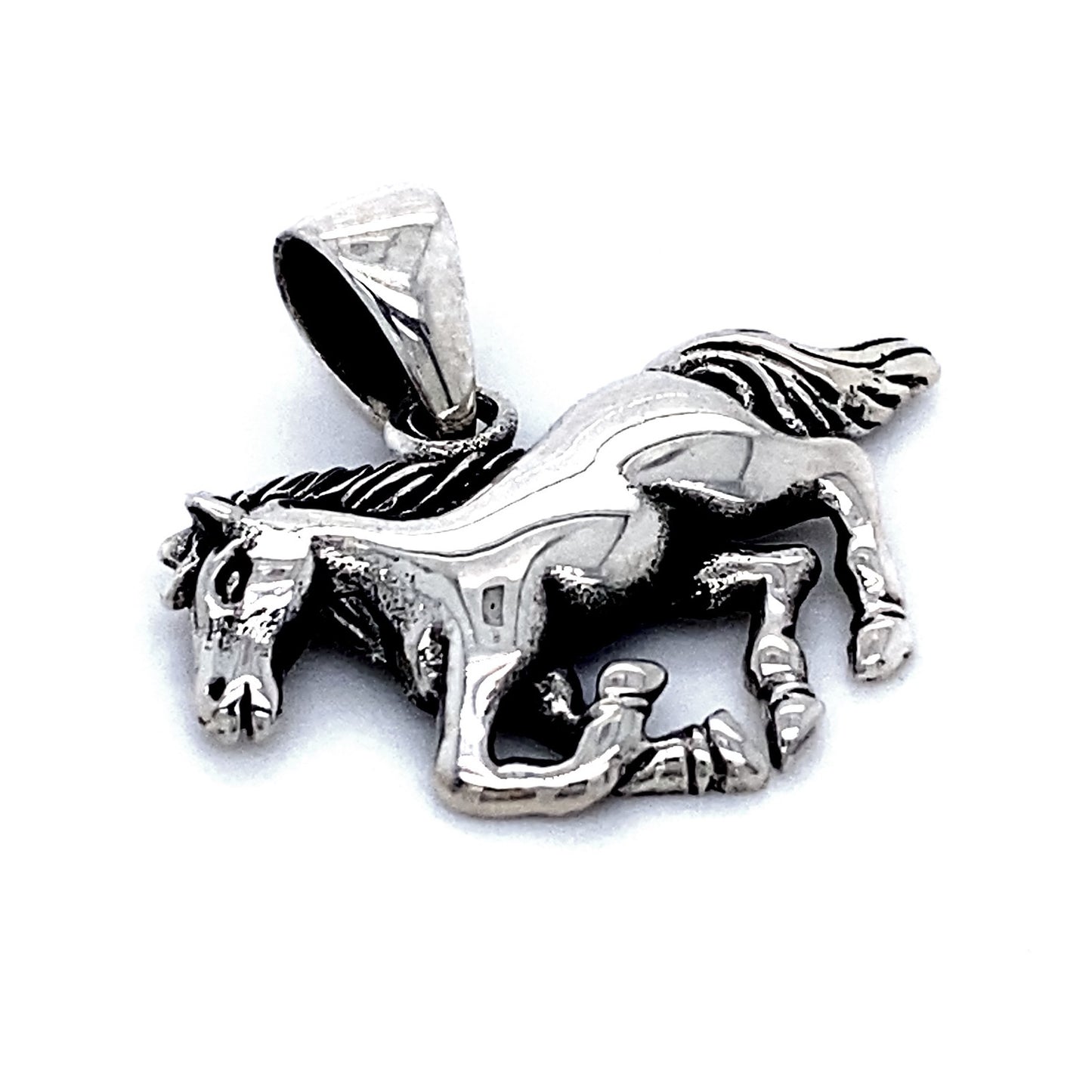 A stunning Galloping Horse Charm, masterfully crafted in the shape of a galloping horse. This exquisite charm captures the grace and spirit of equine beauty, perfect for any jewelry collection.